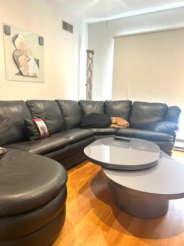 a living room with furniture and a couch