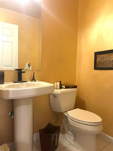 a bathroom with a sink and a toilet