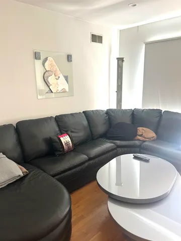 a living room with furniture and a couch
