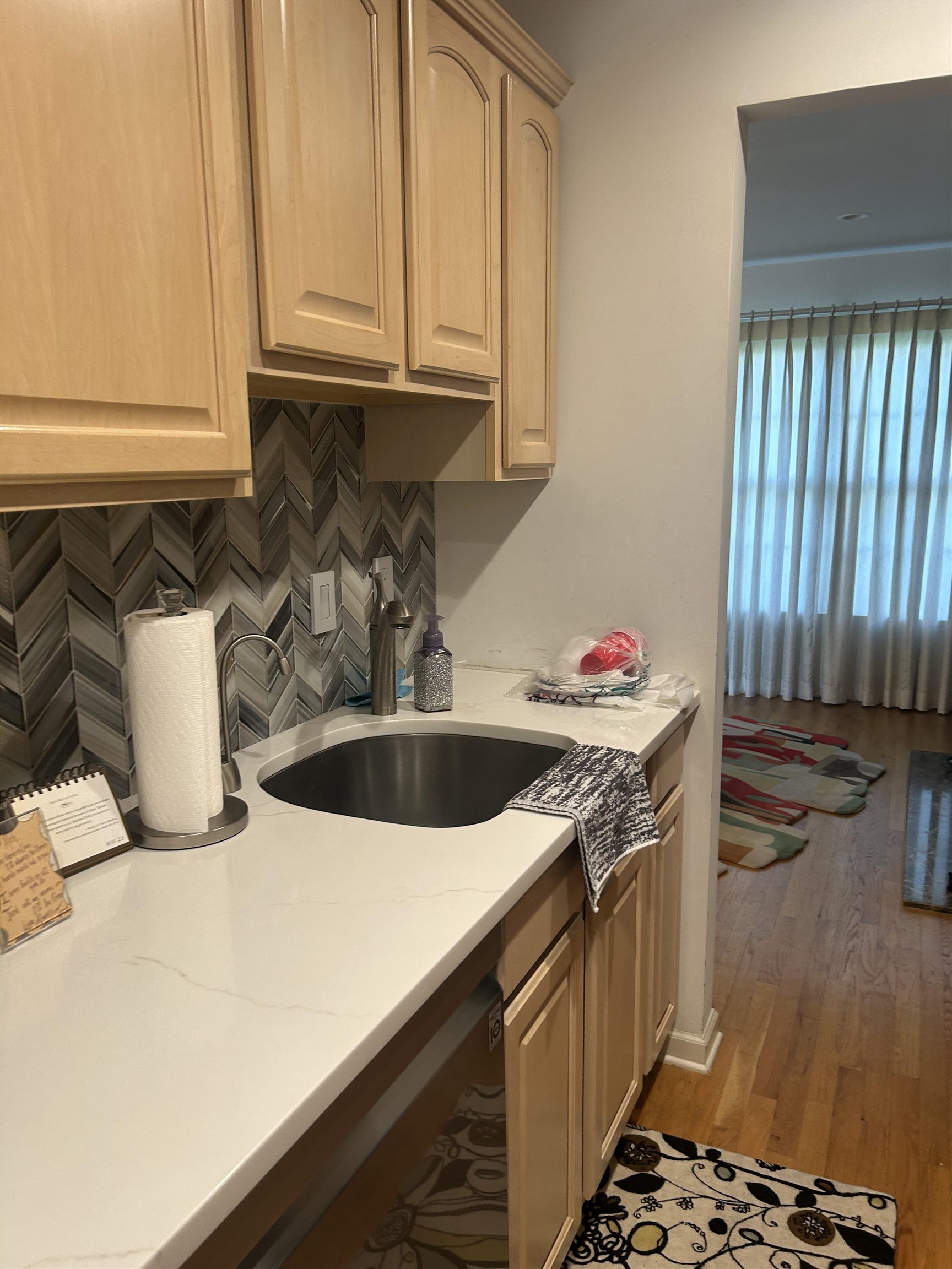 302 Grand Ridge Drive, Unit 302 Ridgefield, NJ 07657 - Photo 26 of 47 a kitchen with stainless steel appliances granite countertop a sink stove and cabinets