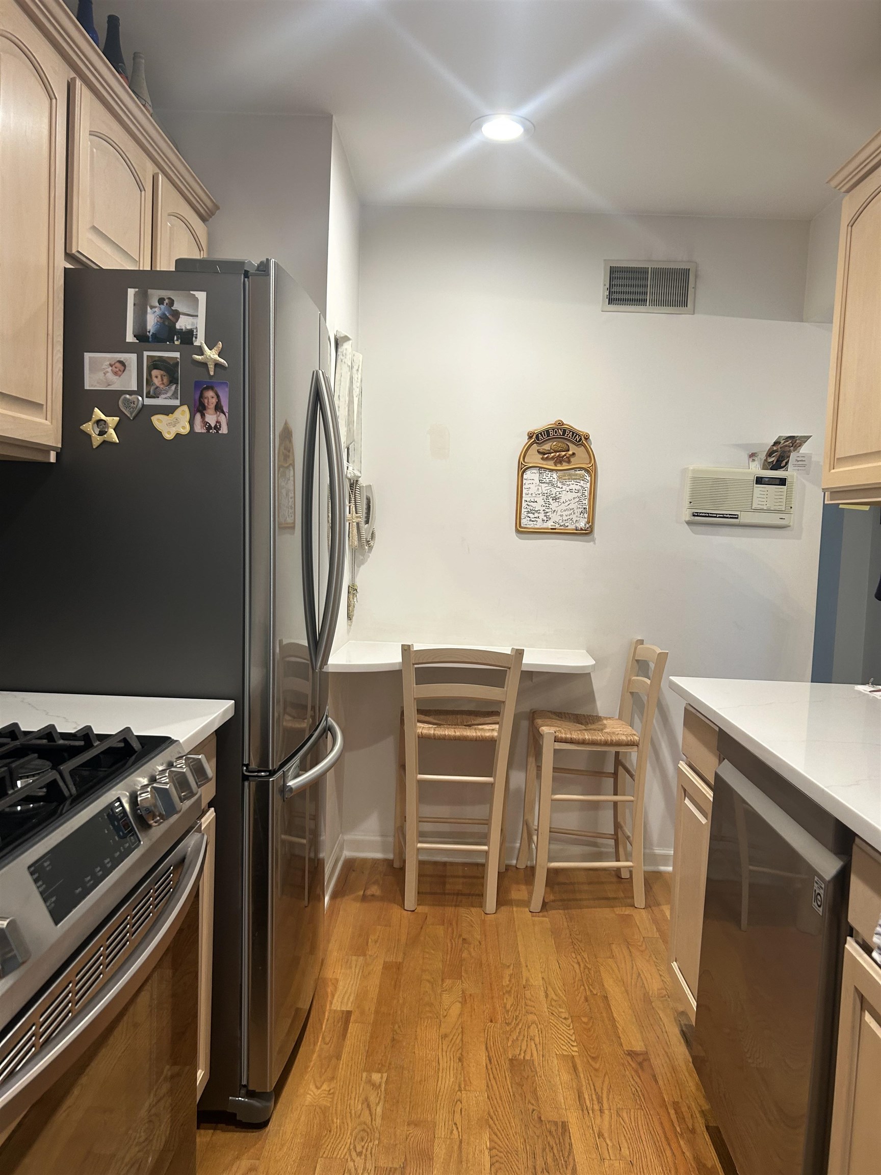 302 Grand Ridge Drive, Unit 302 Ridgefield, NJ 07657 - Photo 27 of 47 a room with wooden floor and furniture