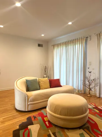 a living room with a couch and a table