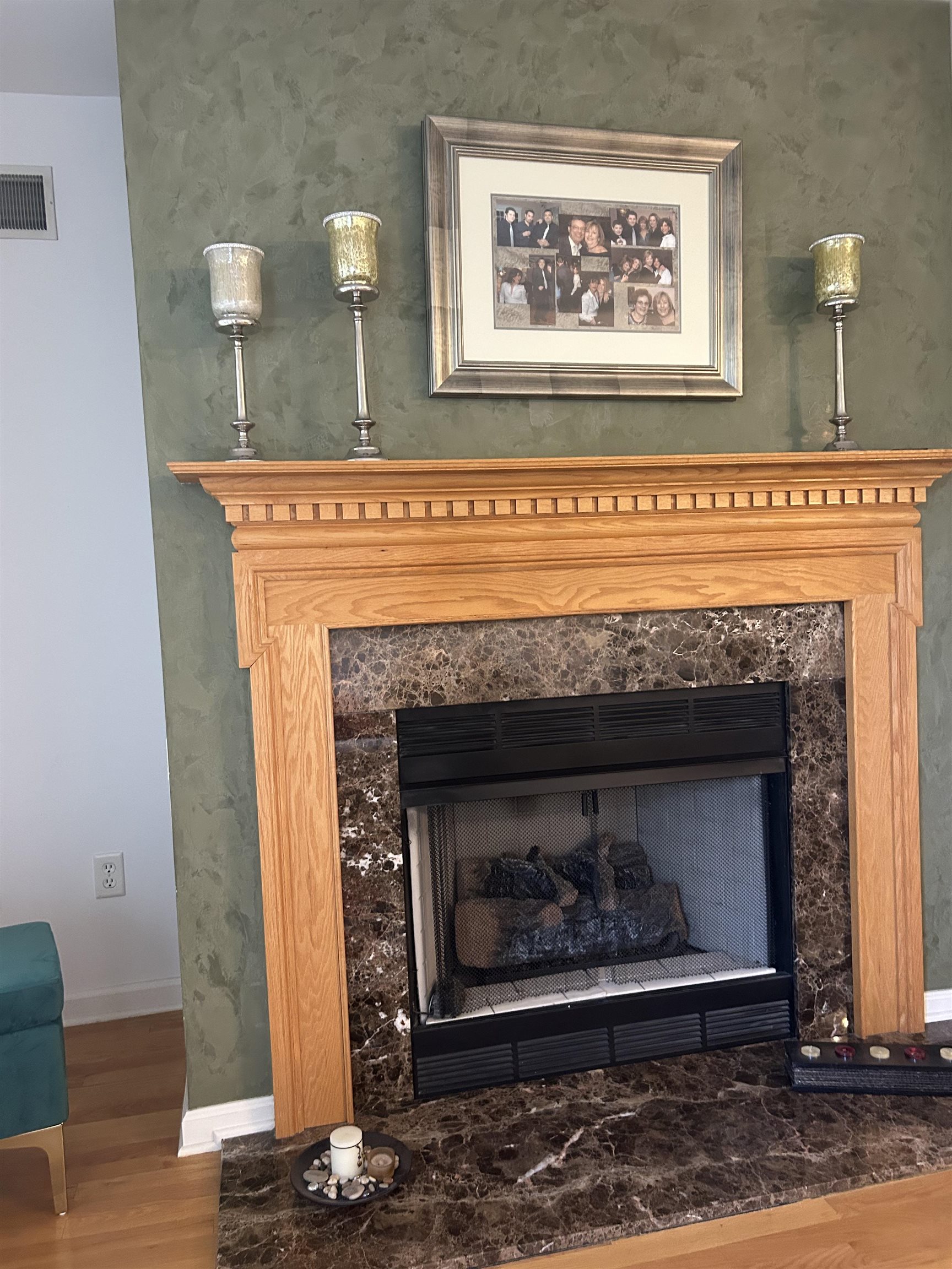 302 Grand Ridge Drive, Unit 302 Ridgefield, NJ 07657 - Photo 35 of 47 a fireplace with a clock on top of it