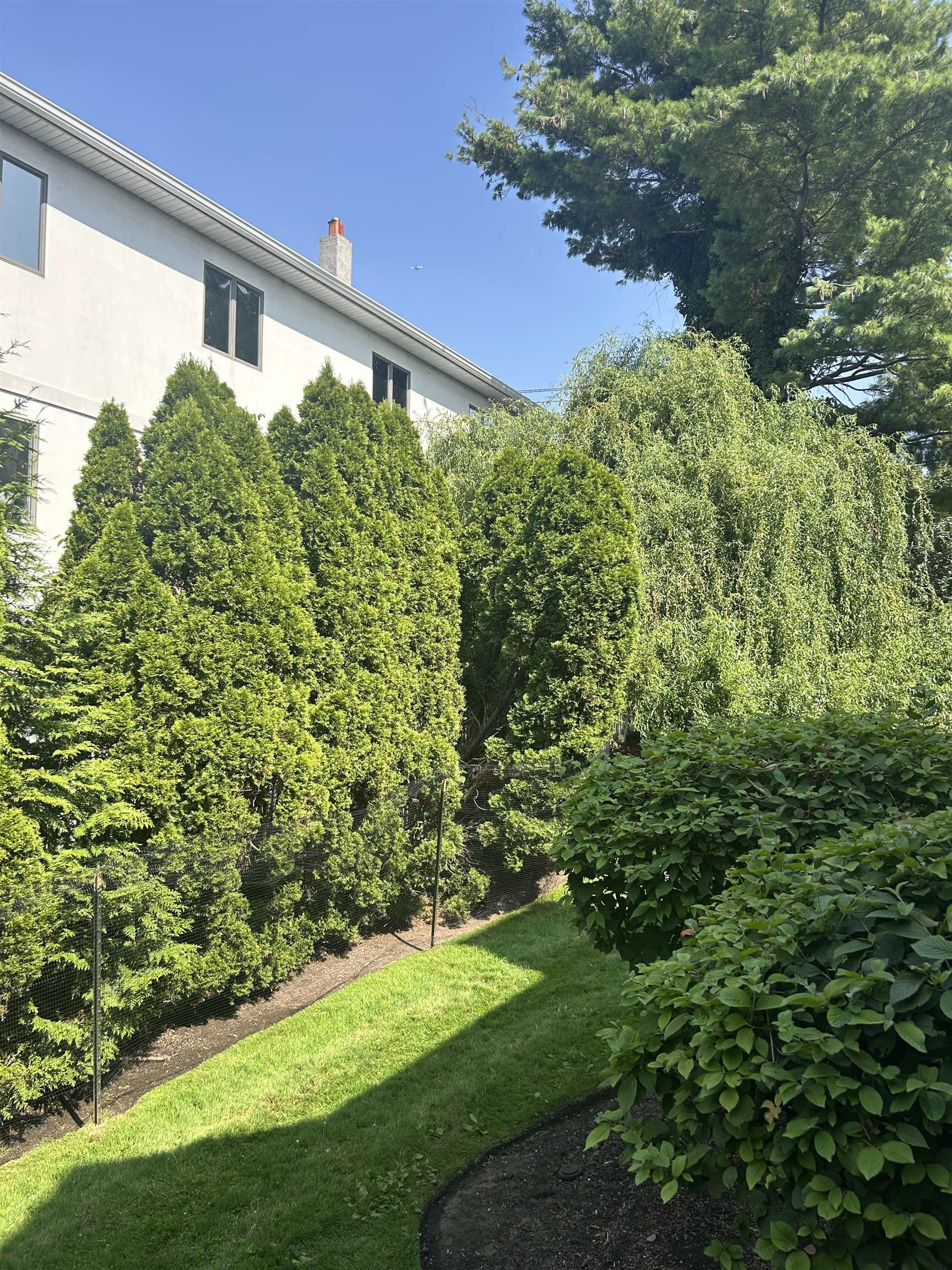 302 Grand Ridge Drive, Unit 302 Ridgefield, NJ 07657 - Photo 37 of 47 a view of a back yard of the house