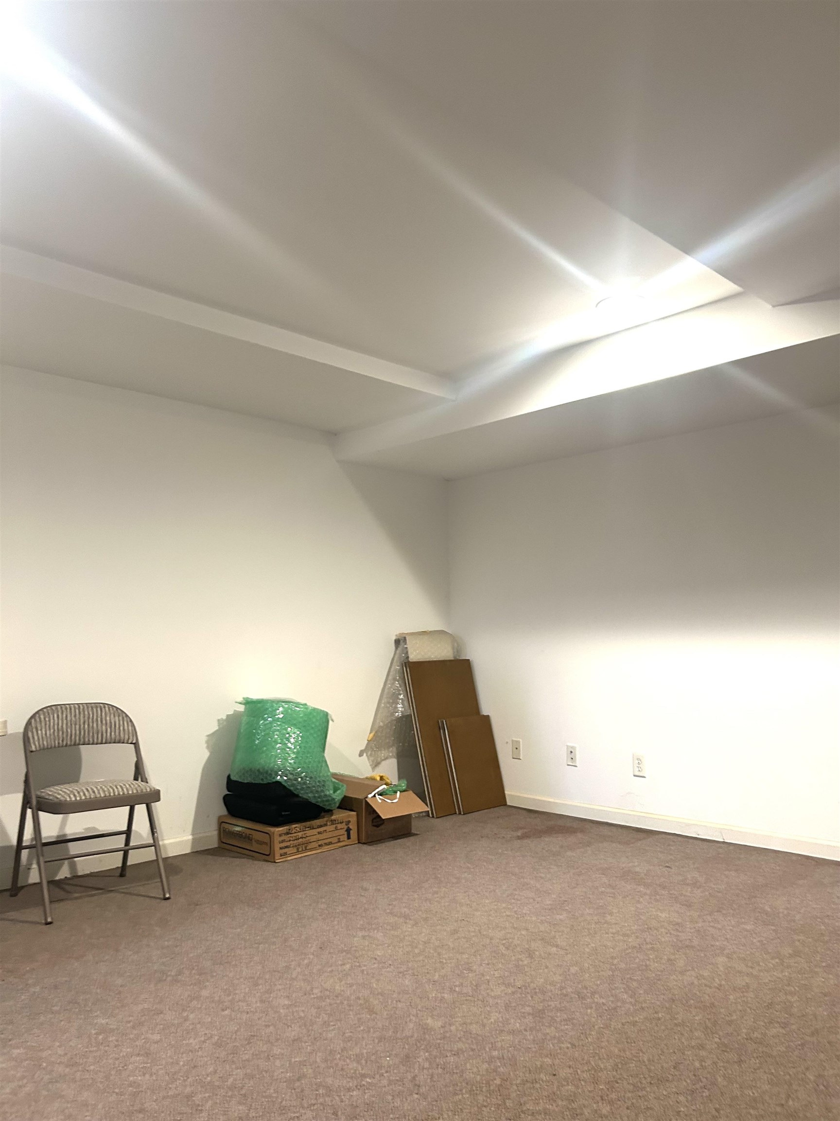 302 Grand Ridge Drive, Unit 302 Ridgefield, NJ 07657 - Photo 46 of 47 a room with a table and a chair