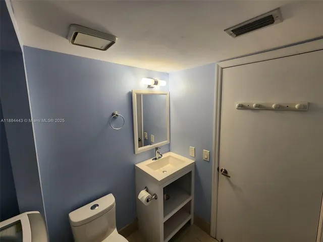a view of washer and dryer in a utility room