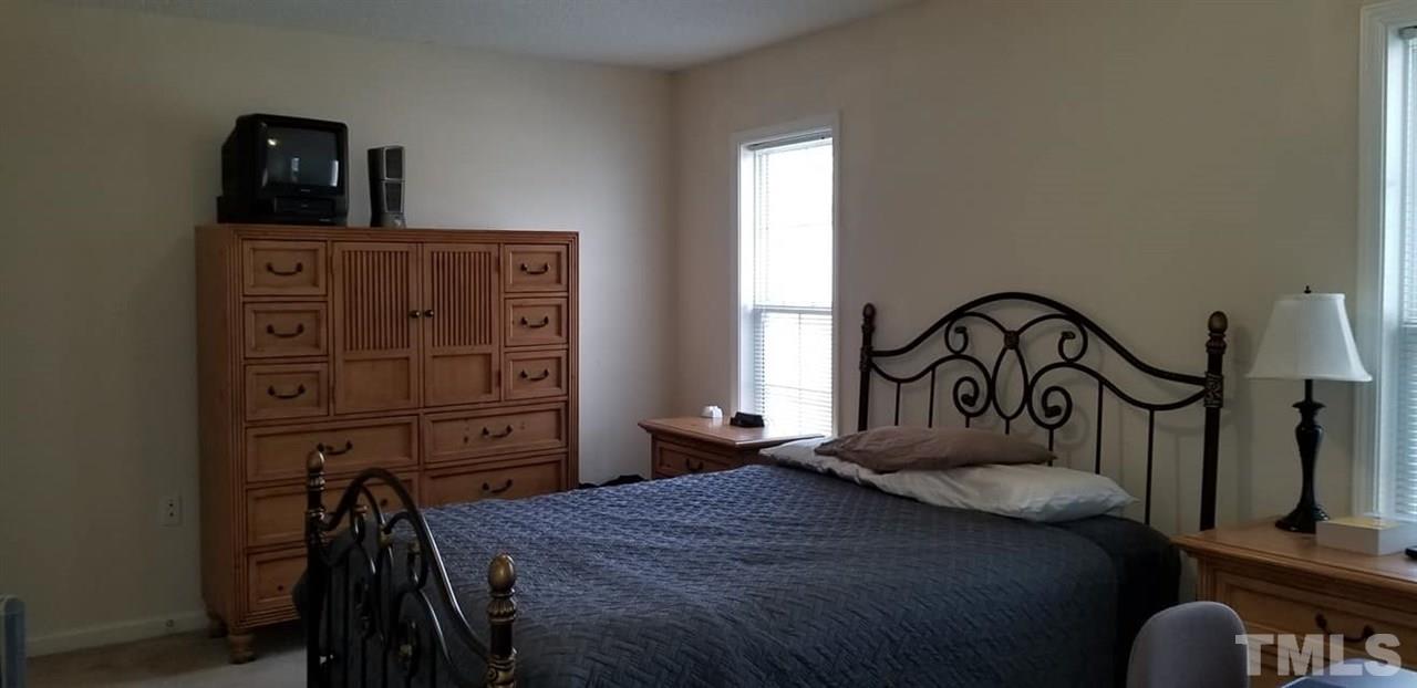 11341 Involute Place, Unit 101 Raleigh, NC 27617 - Photo 11 of 20 This large bedroom includes a walk in closet.