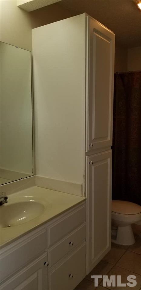 11341 Involute Place, Unit 101 Raleigh, NC 27617 - Photo 12 of 20 The guest/hallway bathroom is accessible from the living room as well as the secondary bedroom.