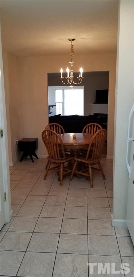 11341 Involute Place, Unit 101 Raleigh, NC 27617 - Photo 15 of 20 A view of the dining area from the kitchen.