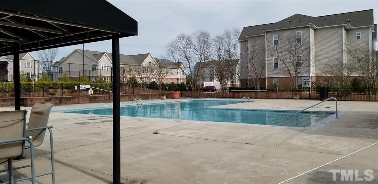 11341 Involute Place, Unit 101 Raleigh, NC 27617 - Photo 18 of 20 Lounge at the community pool. There is also a gas grill on the pool deck and a covered area to sit!