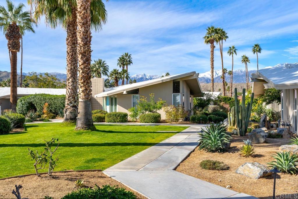 37800 Da Vall Drive, Unit 10 Rancho Mirage, CA 92270 - Photo 24 of 31 a front view of a house with garden