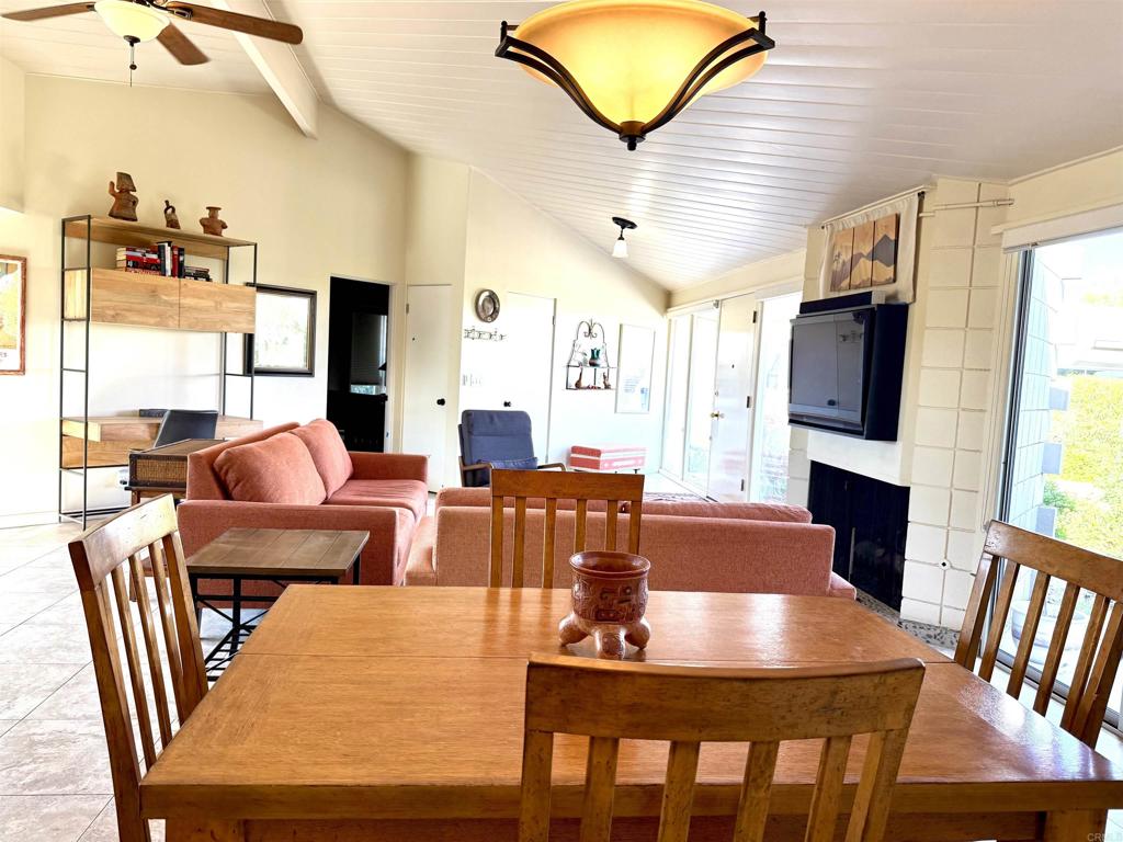 37800 Da Vall Drive, Unit 10 Rancho Mirage, CA 92270 - Photo 4 of 31 a view of a dining room with furniture window and wooden floor