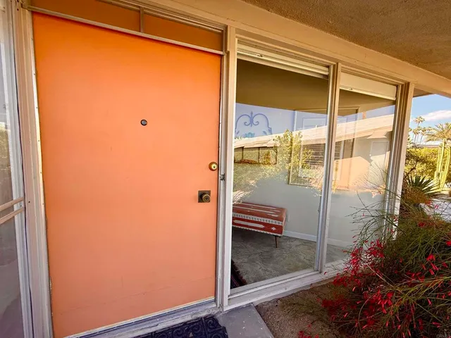 a view of a porch with a door