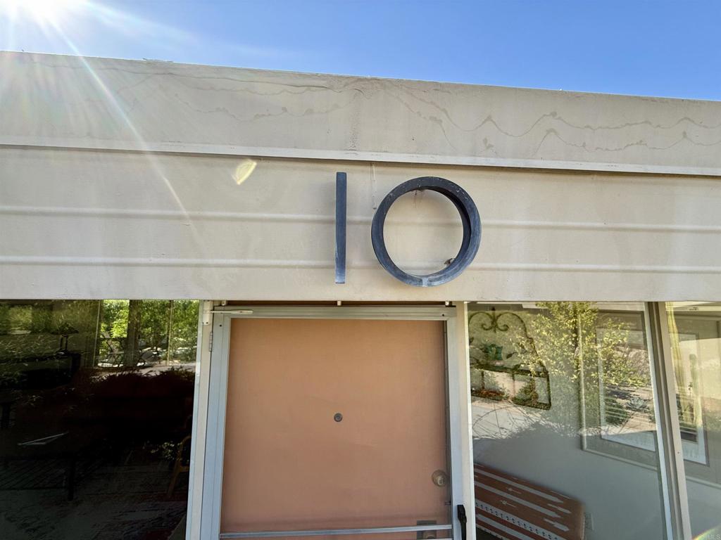 37800 Da Vall Drive, Unit 10 Rancho Mirage, CA 92270 - Photo 9 of 31 a bathroom with a shower and a mirror