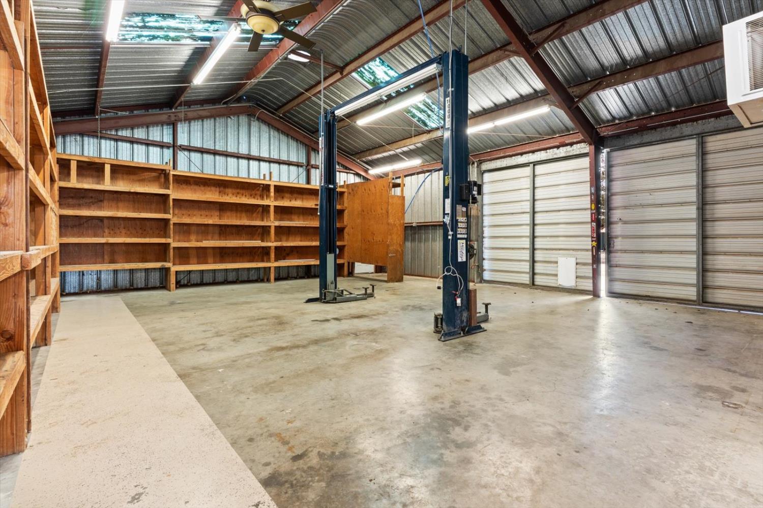 8335 Bailey Road Yuba City, CA 95993 - Photo 27 of 56 a view of an empty room with wooden floor and windows