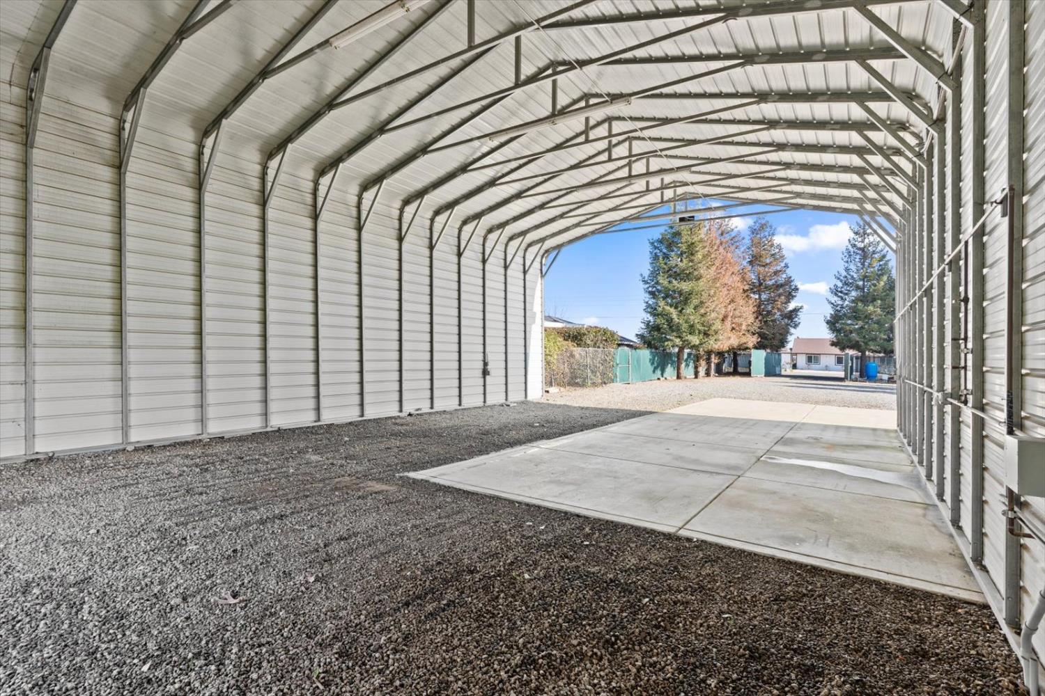 8335 Bailey Road Yuba City, CA 95993 - Photo 4 of 56 a view of a house with a backyard