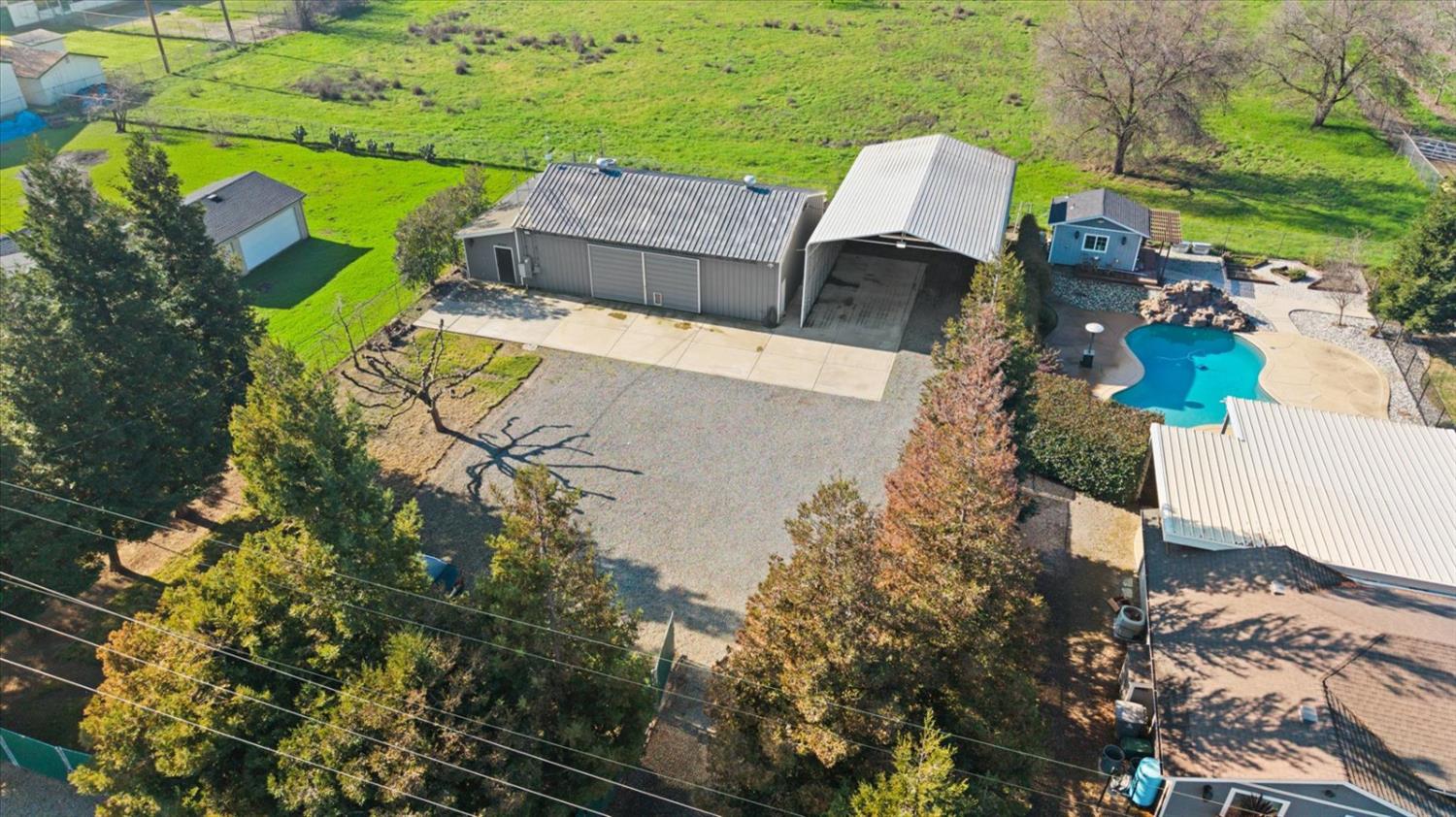 8335 Bailey Road Yuba City, CA 95993 - Photo 43 of 56 an aerial view of a house with a yard and lake view