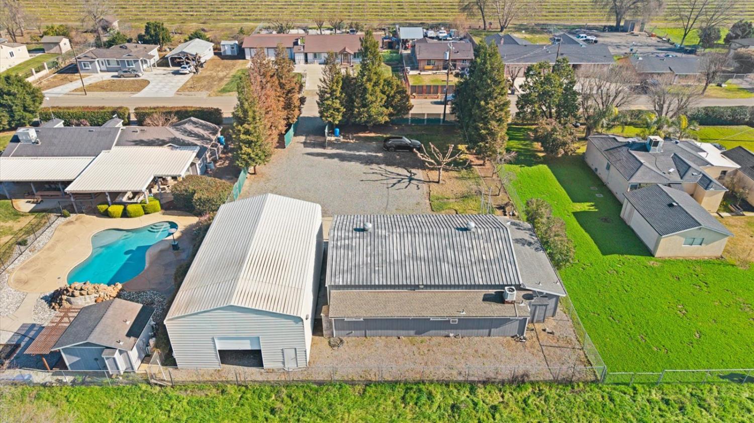 8335 Bailey Road Yuba City, CA 95993 - Photo 44 of 56 an aerial view of a house with a swimming pool