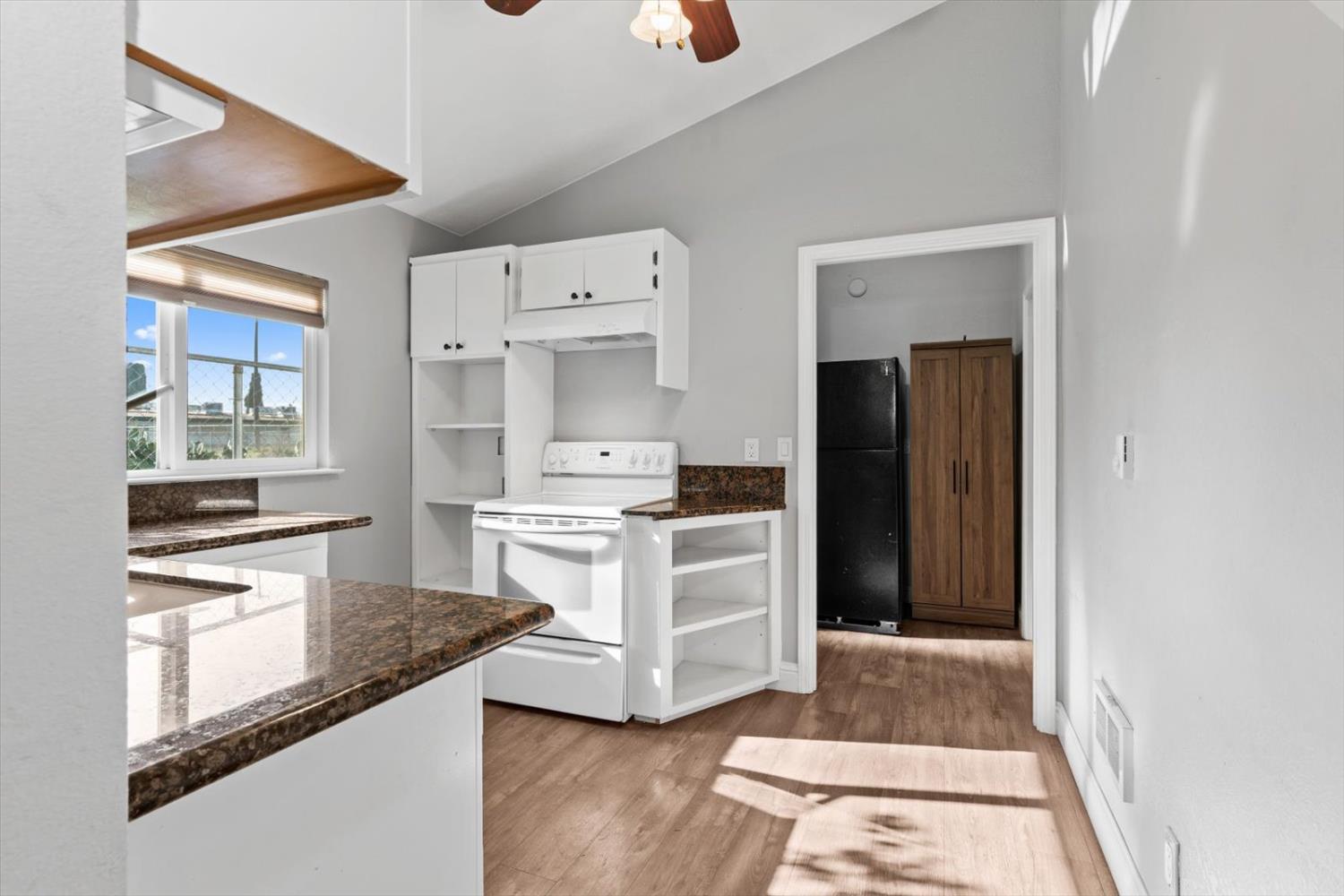 8335 Bailey Road Yuba City, CA 95993 - Photo 10 of 56 a kitchen with stainless steel appliances a stove and a refrigerator
