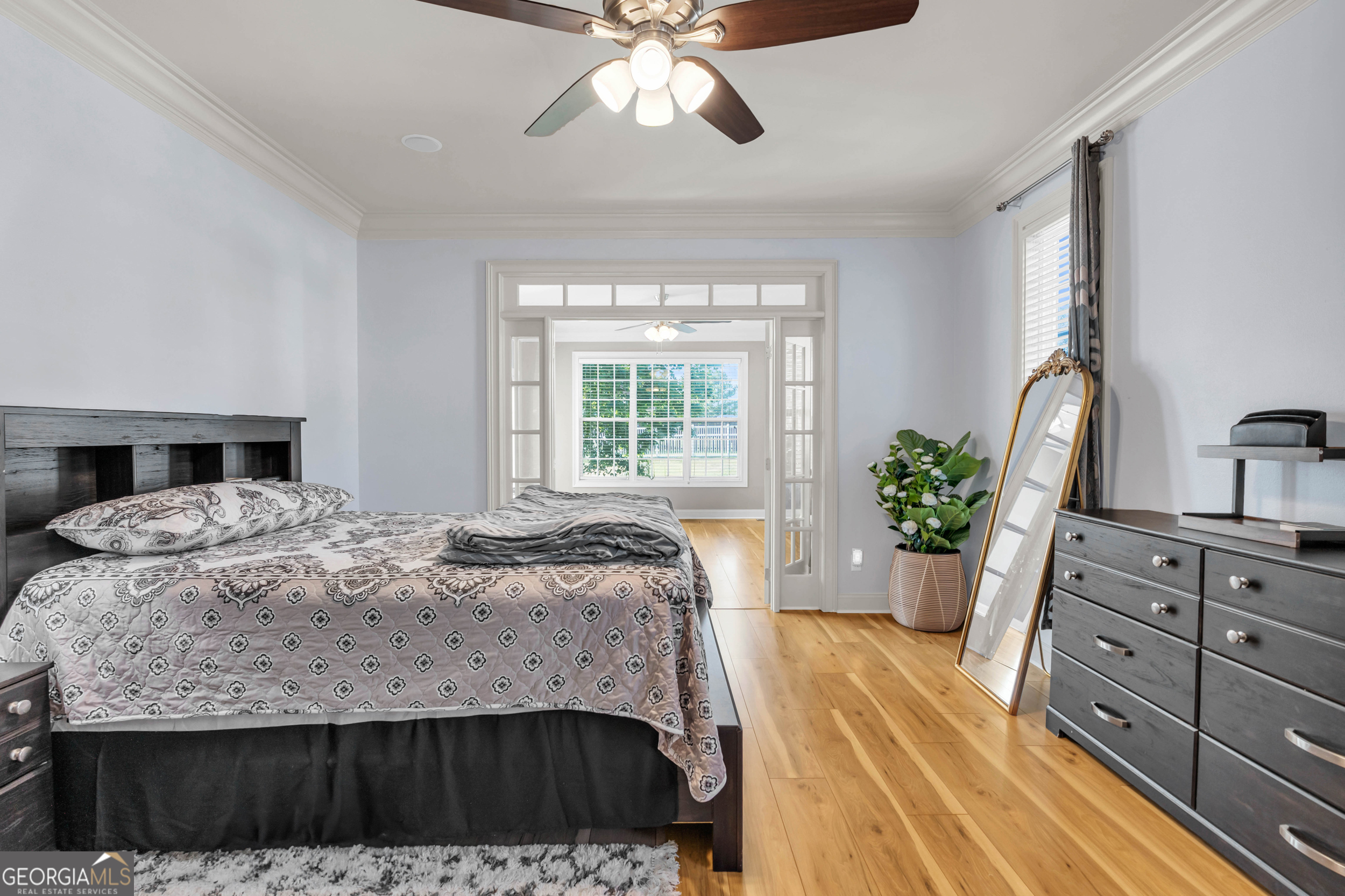 504 Ridge Pointe Lane Cohutta, GA 30710 - Photo 15 of 58 a bedroom with a bed and a potted plant