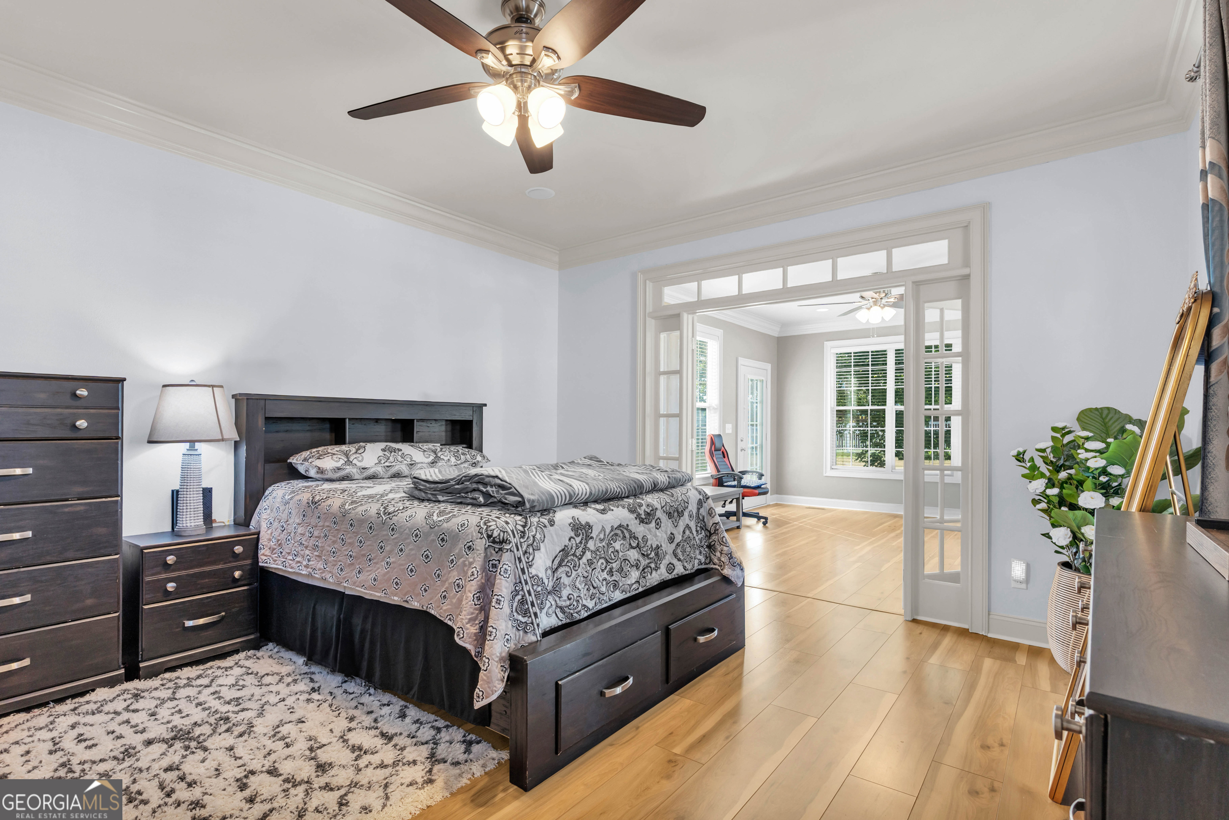 504 Ridge Pointe Lane Cohutta, GA 30710 - Photo 16 of 58 a bedroom with a bed and wooden floor