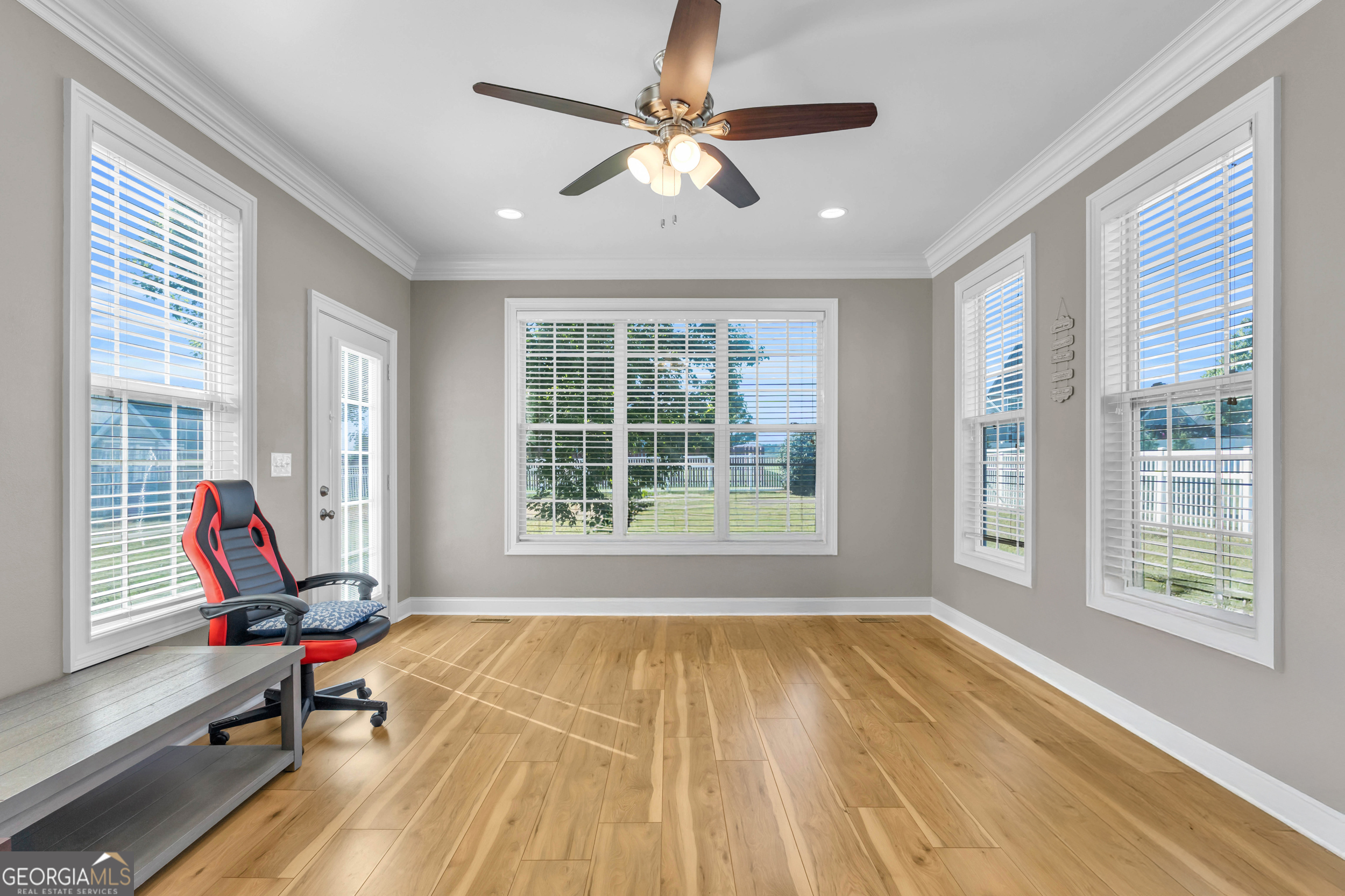 504 Ridge Pointe Lane Cohutta, GA 30710 - Photo 17 of 58 a living room with a balcony wooden floor and a window