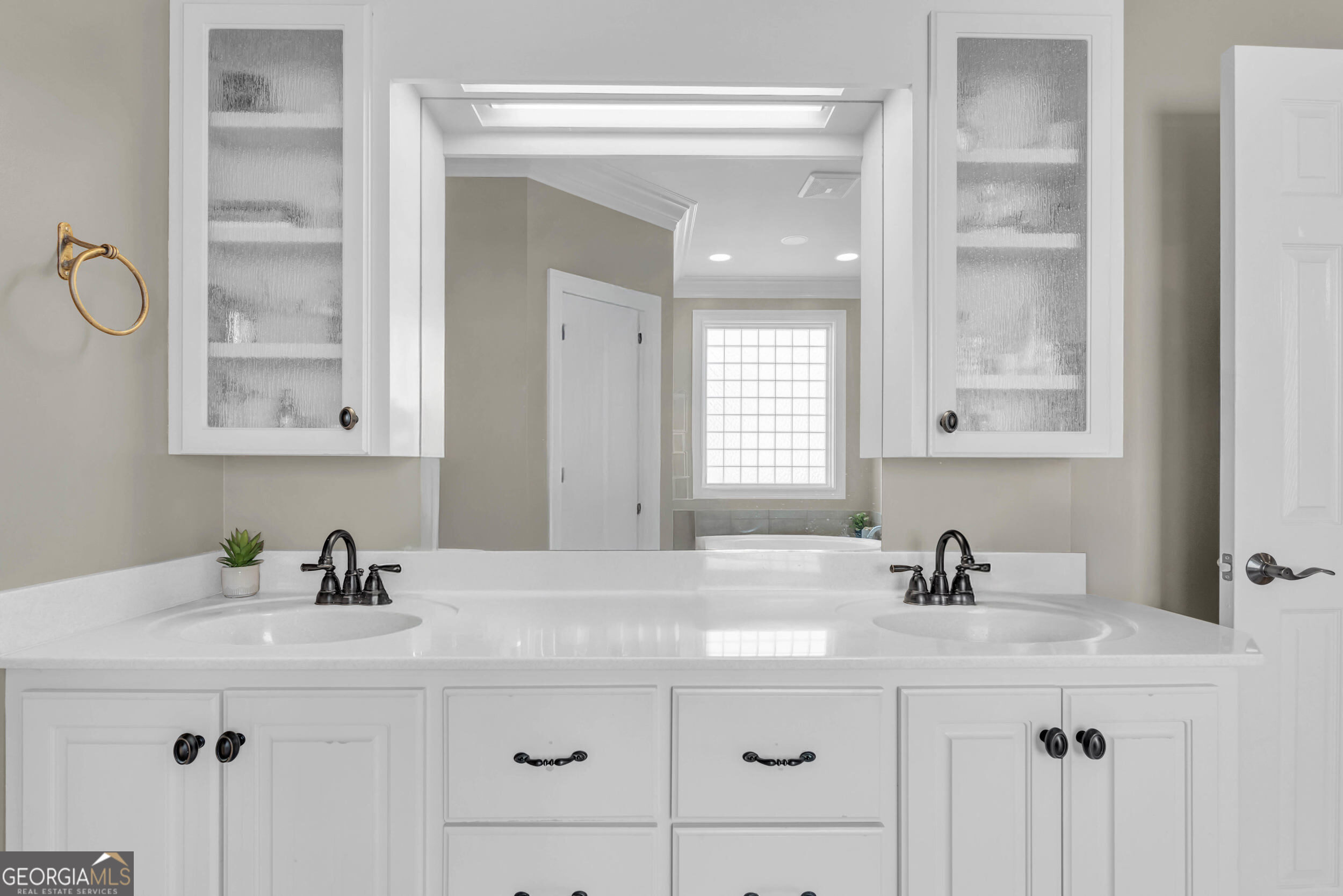 504 Ridge Pointe Lane Cohutta, GA 30710 - Photo 19 of 58 a bathroom with a sink double vanity and a mirror
