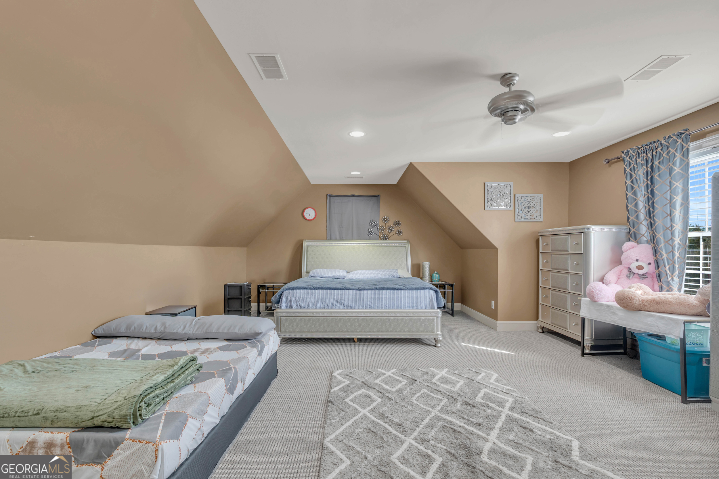504 Ridge Pointe Lane Cohutta, GA 30710 - Photo 29 of 58 a spacious bedroom with a bed and window
