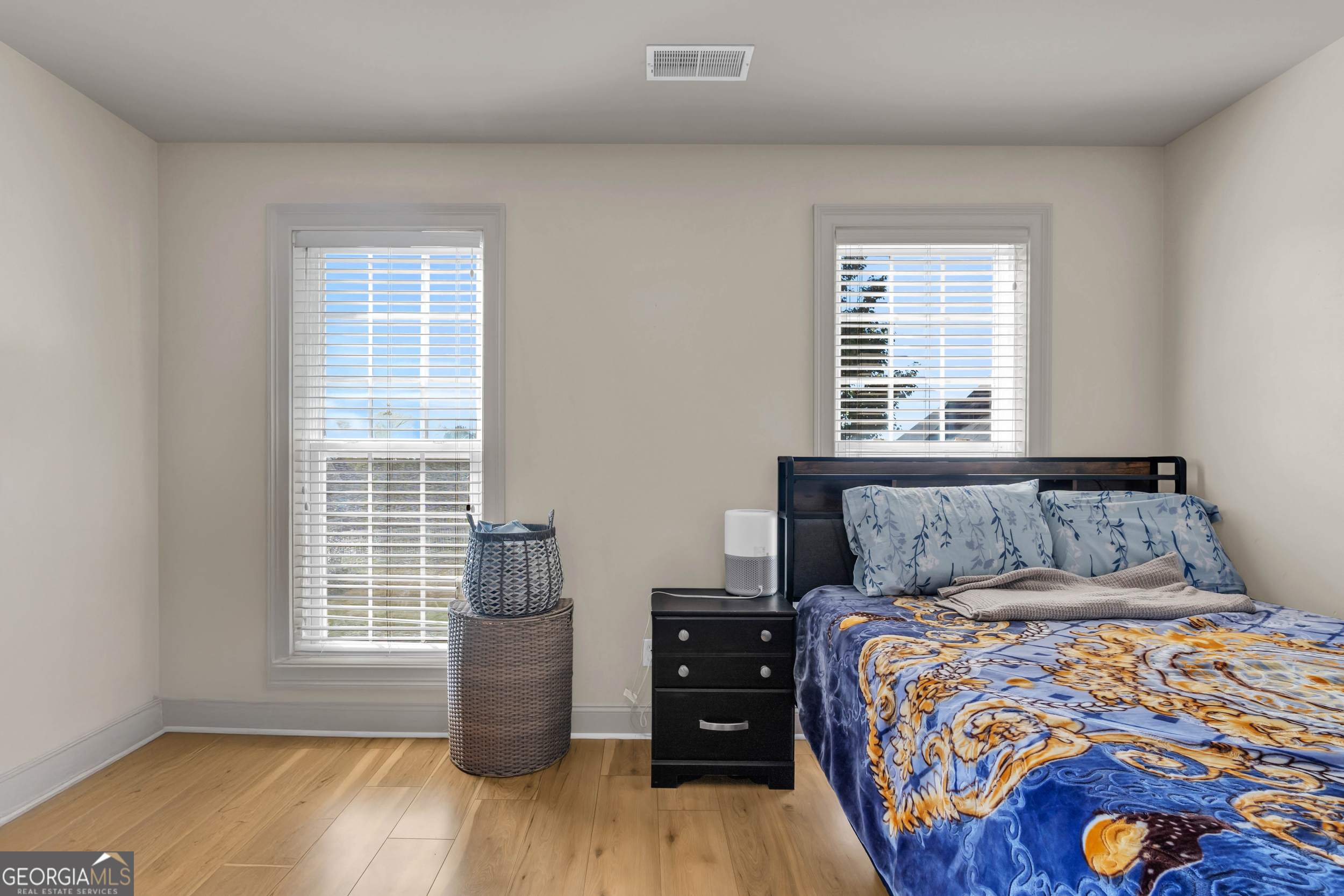 504 Ridge Pointe Lane Cohutta, GA 30710 - Photo 33 of 58 a bedroom with a bed and wooden floor