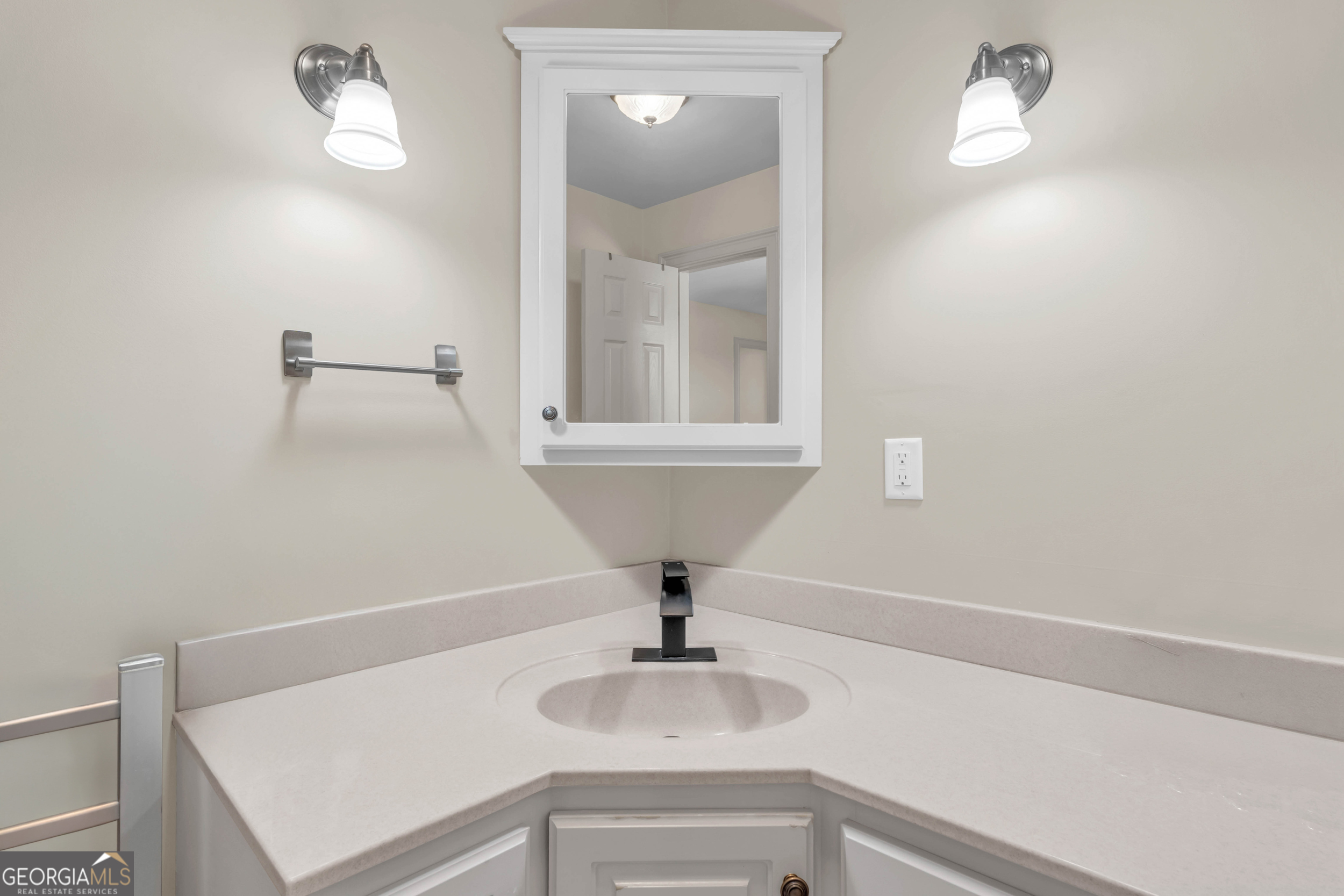504 Ridge Pointe Lane Cohutta, GA 30710 - Photo 37 of 58 a bathroom with a sink and a mirror
