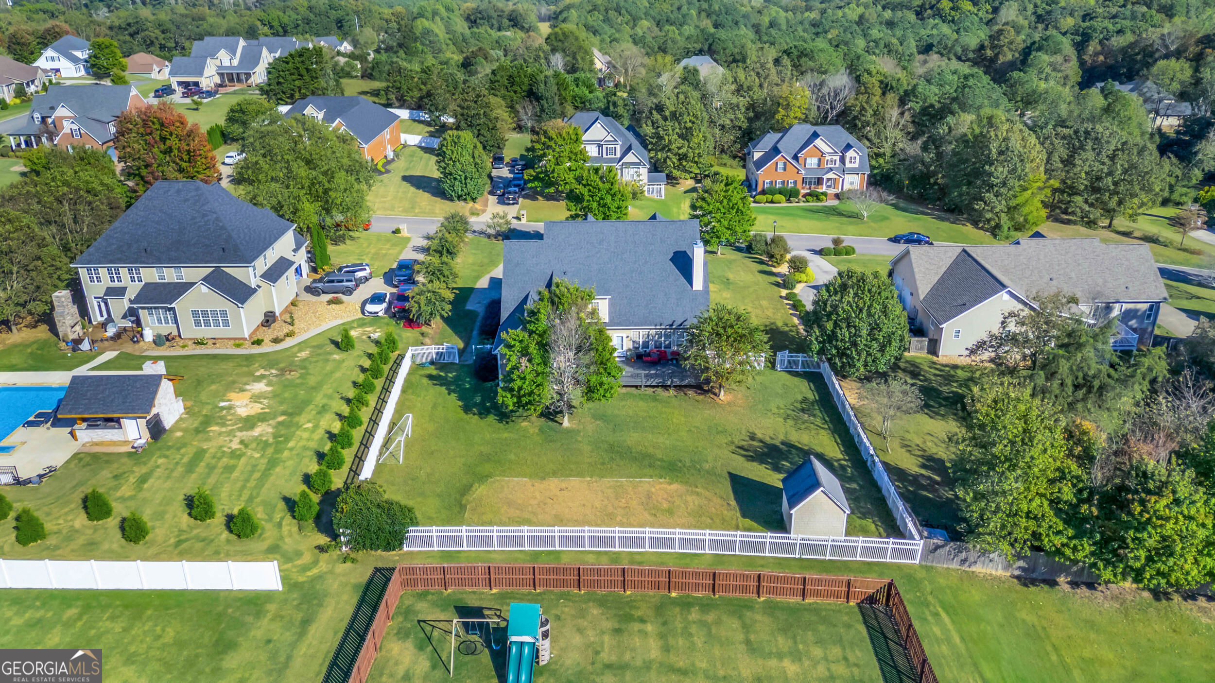 504 Ridge Pointe Lane Cohutta, GA 30710 - Photo 53 of 58 an aerial view of residential houses with outdoor space and a lake view