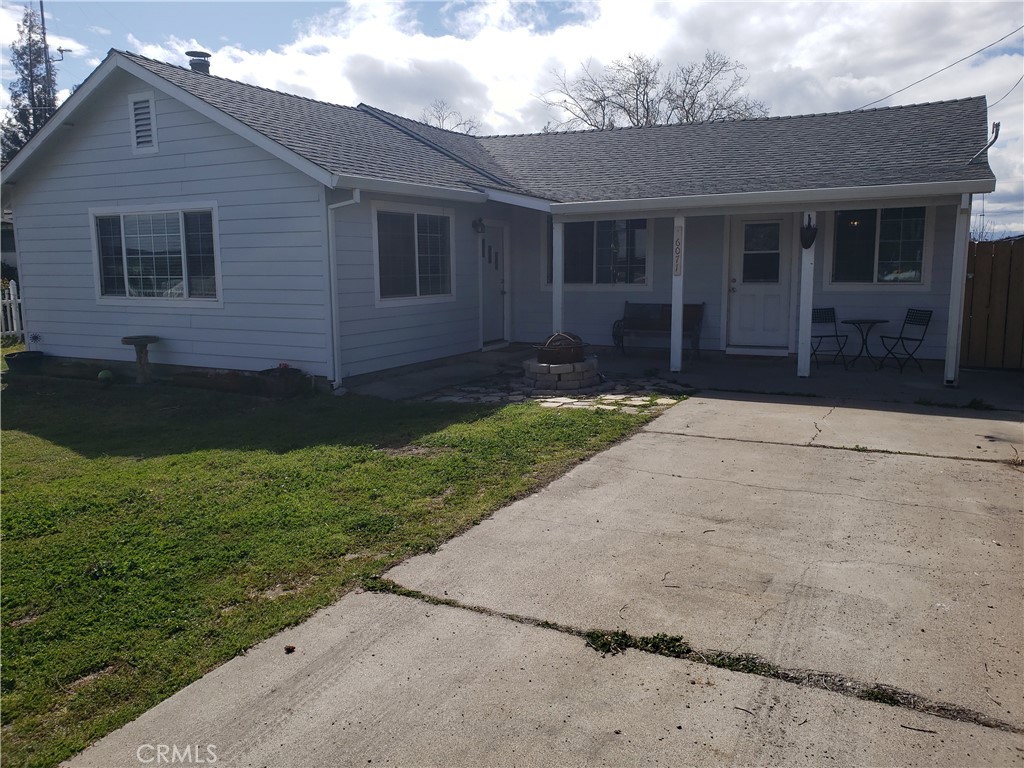 6071 Alameda Road Richfield, CA 96021 - Photo 1 of 1 a front view of a house with garden