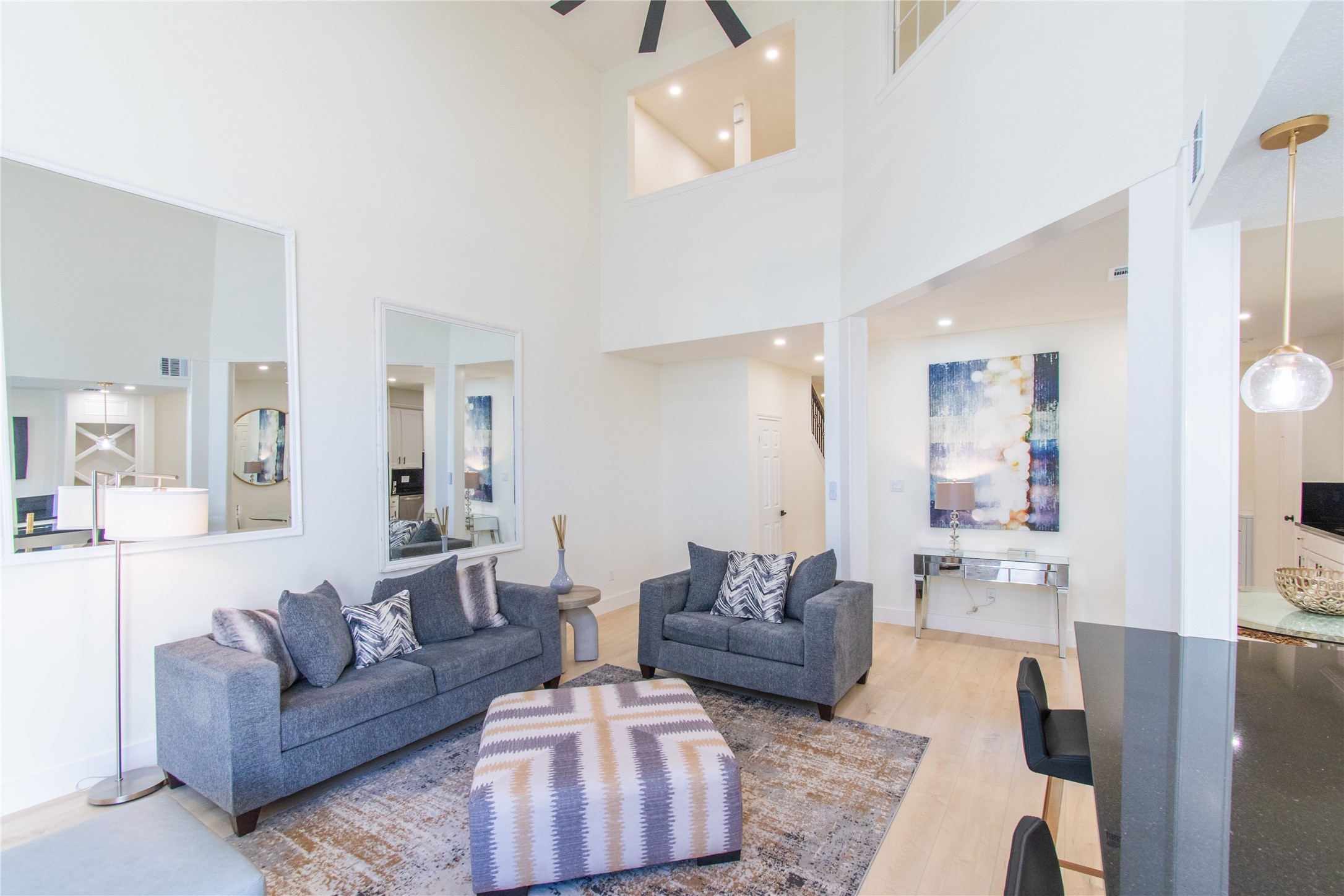 727 Bunker Hill Road, Unit 43 Houston, TX 77024 - Photo 11 of 36 a living room with furniture and a couch