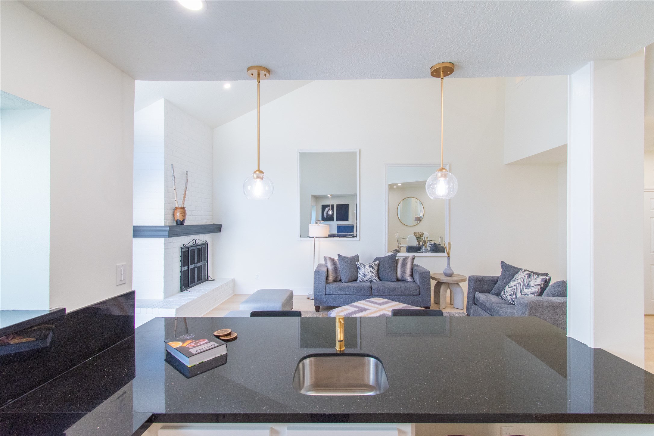 727 Bunker Hill Road, Unit 43 Houston, TX 77024 - Photo 14 of 36 a living room with furniture and a table