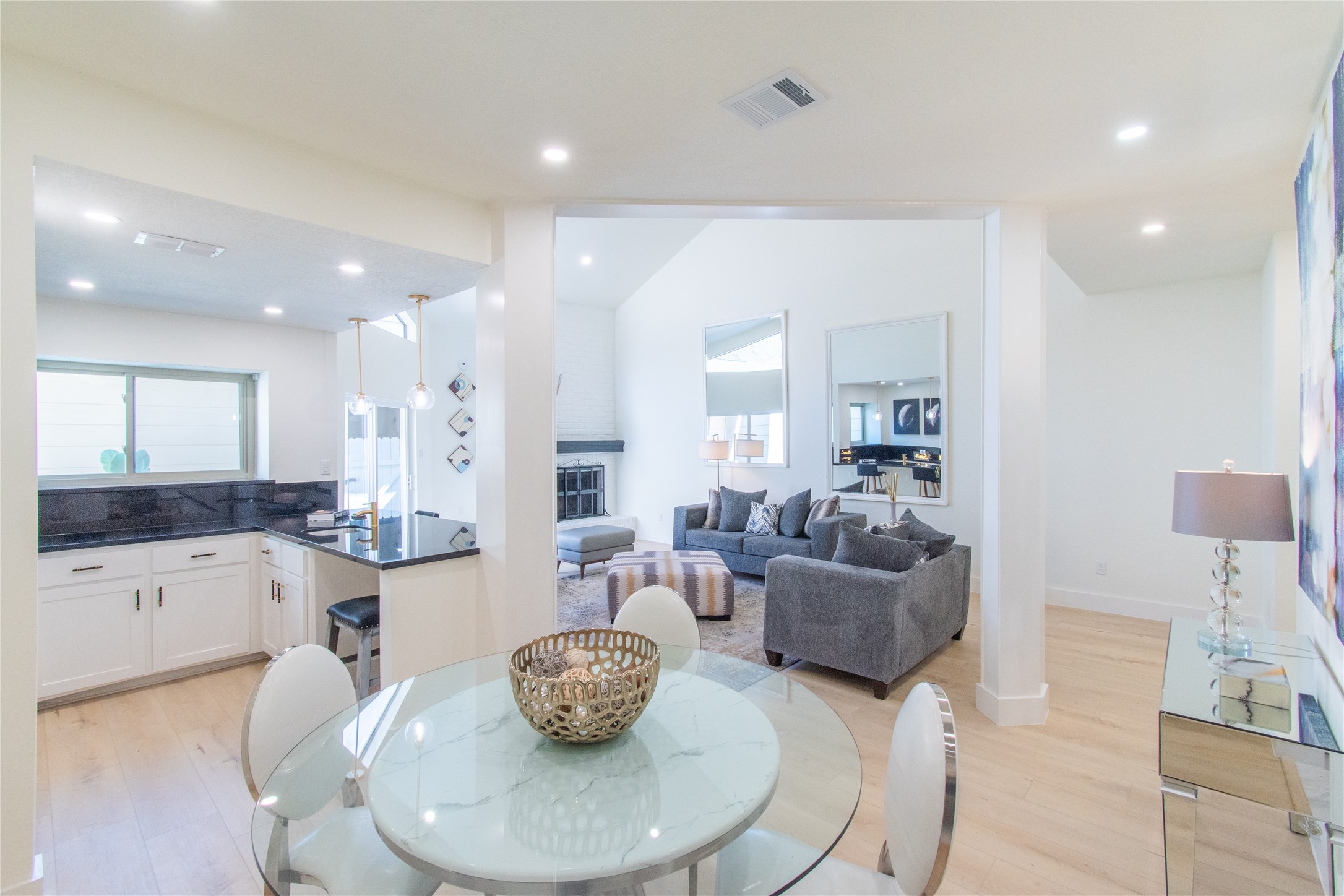 727 Bunker Hill Road, Unit 43 Houston, TX 77024 - Photo 15 of 36 a living room with furniture and a wooden floor