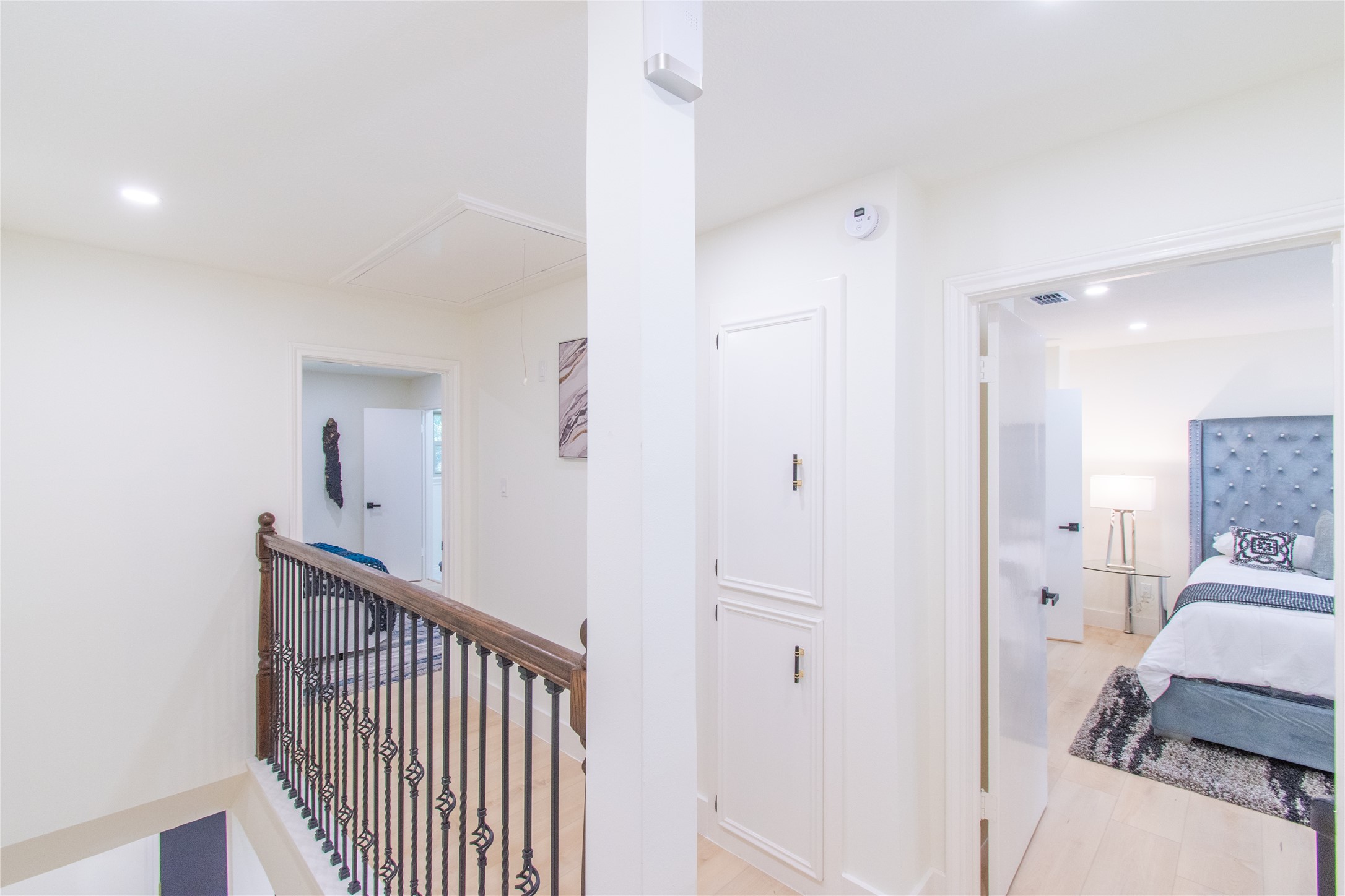 727 Bunker Hill Road, Unit 43 Houston, TX 77024 - Photo 23 of 36 a view of a bedroom from a hallway