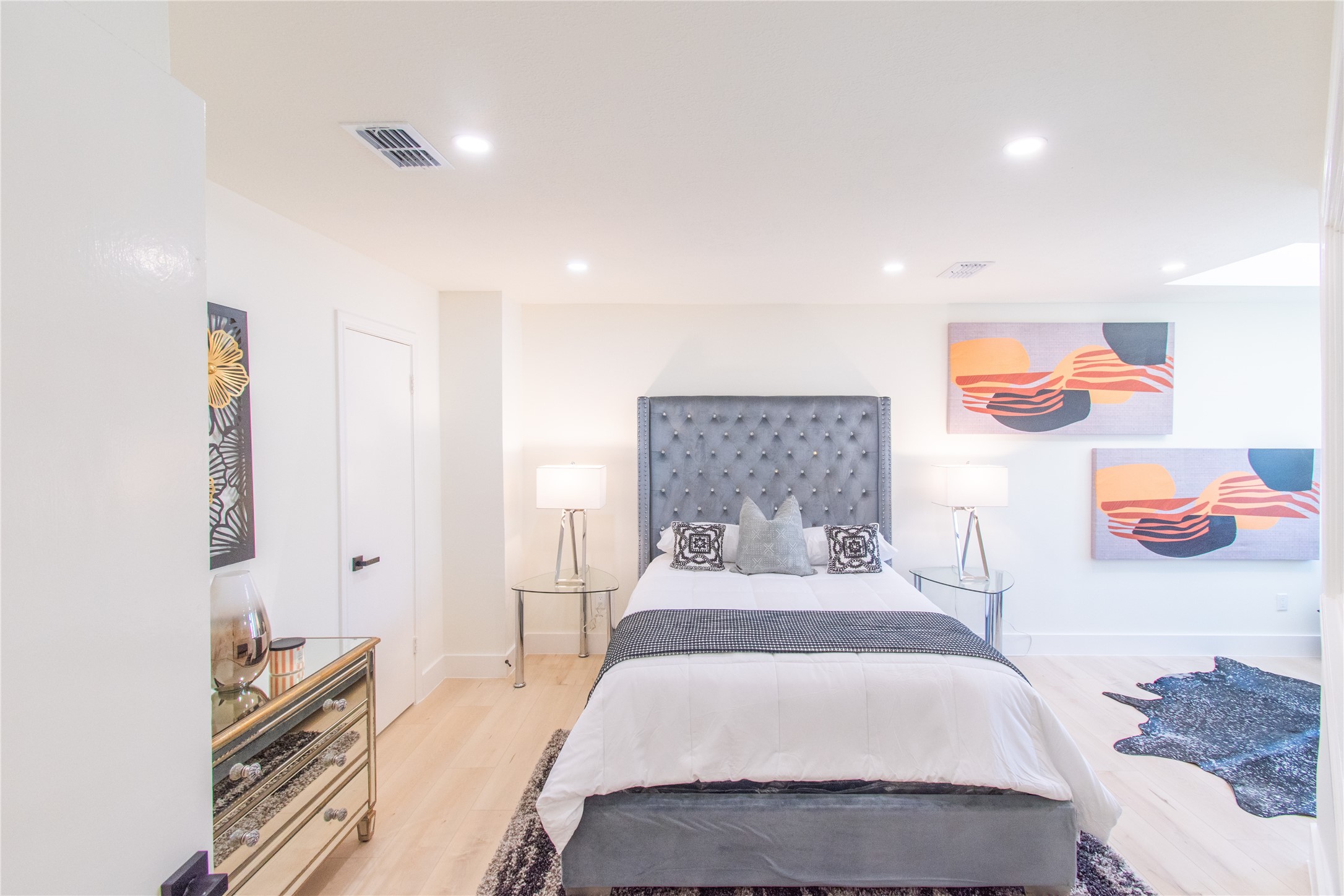 727 Bunker Hill Road, Unit 43 Houston, TX 77024 - Photo 28 of 36 a bedroom with a bed and a couch