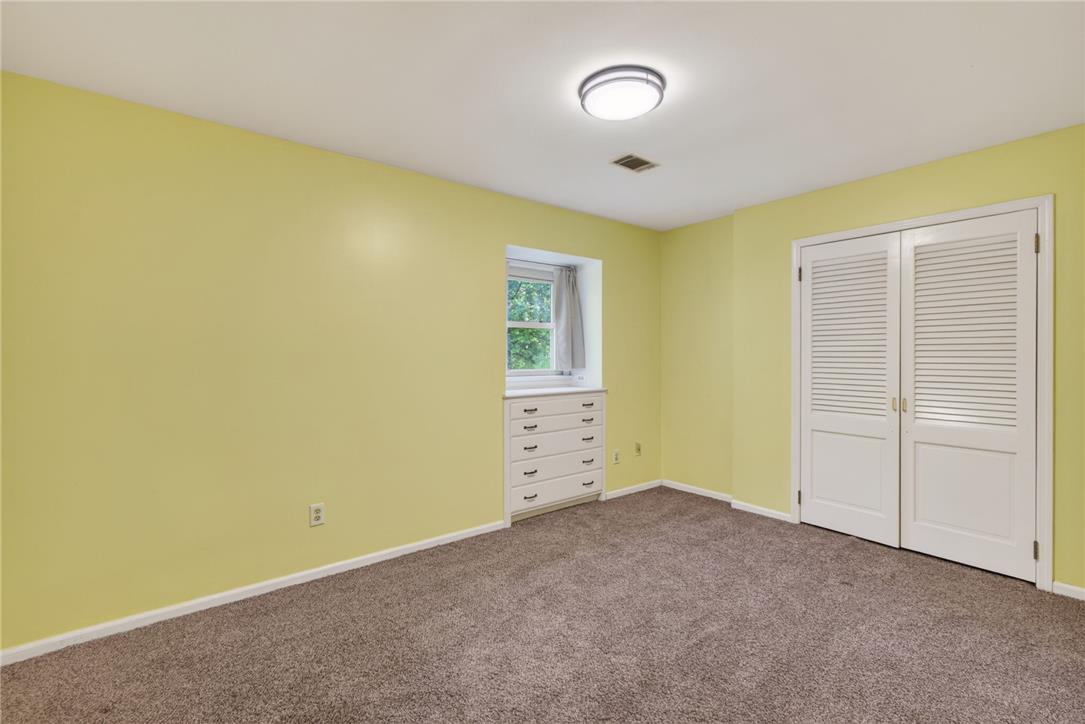 1371 Stoke Park Road Bethlehem, PA 18017 - Photo 39 of 55 an empty room with windows