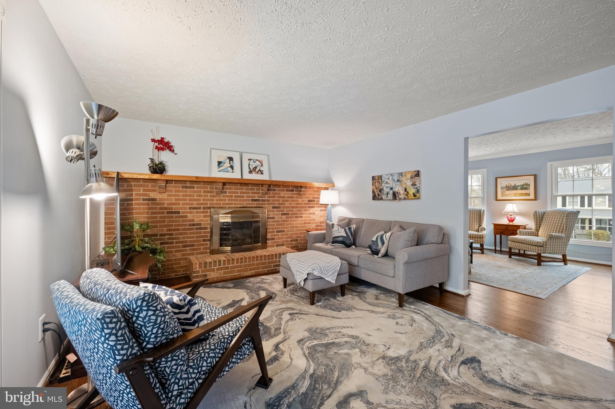 1374 Rock Chapel Road Herndon, VA 20170 - Photo 13 of 38 a living room with furniture and a couch