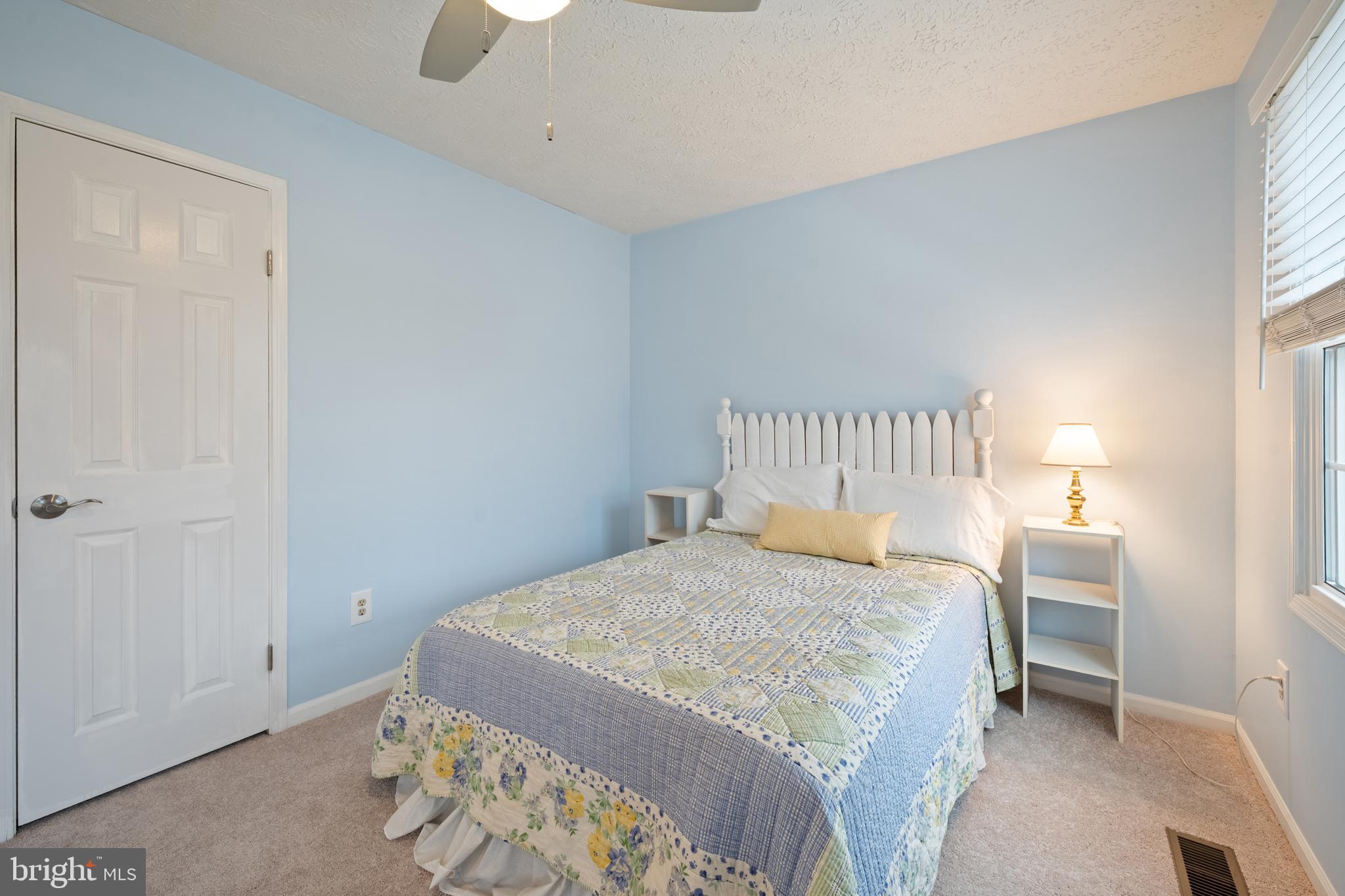 1374 Rock Chapel Road Herndon, VA 20170 - Photo 21 of 38 a bedroom with a bed and a window