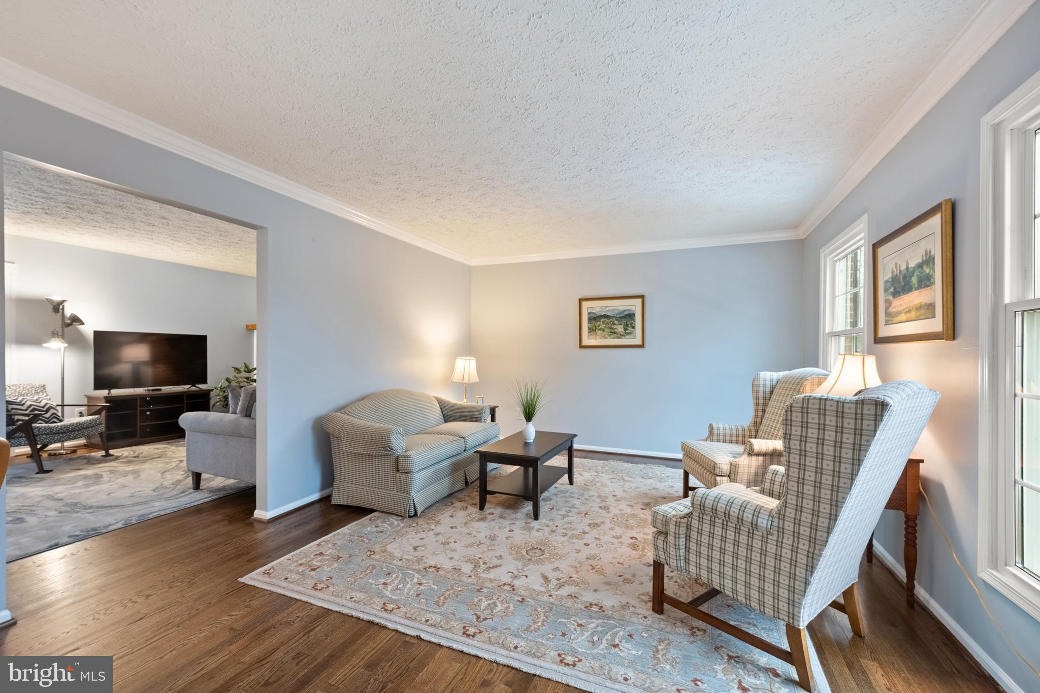 1374 Rock Chapel Road Herndon, VA 20170 - Photo 5 of 38 a living room with furniture and a flat screen tv