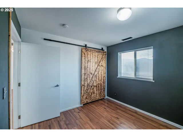 a view interior of a house with wooden floor and windows