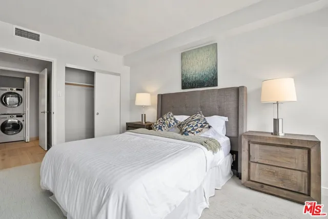 a kitchen with stainless steel appliances a stove a sink and a microwave