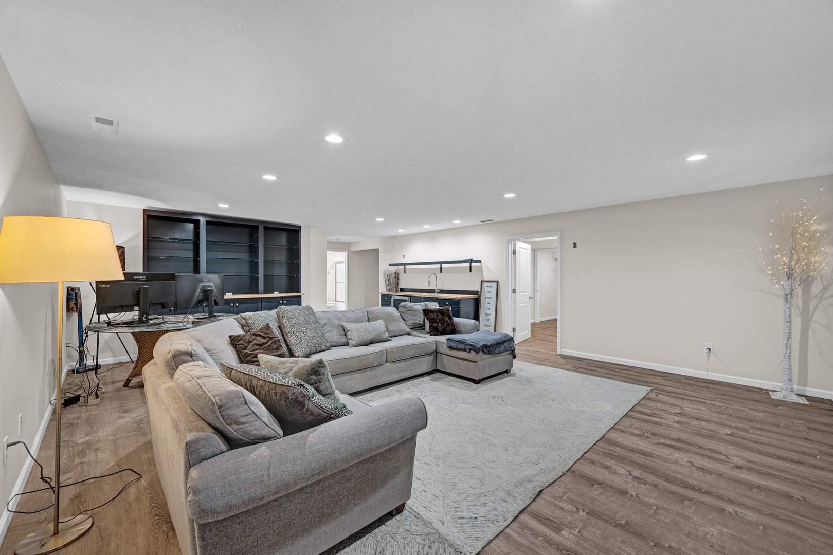 277 Cassidy Road Normal, IL 61761 - Photo 25 of 42 a living room with furniture and a wooden floor