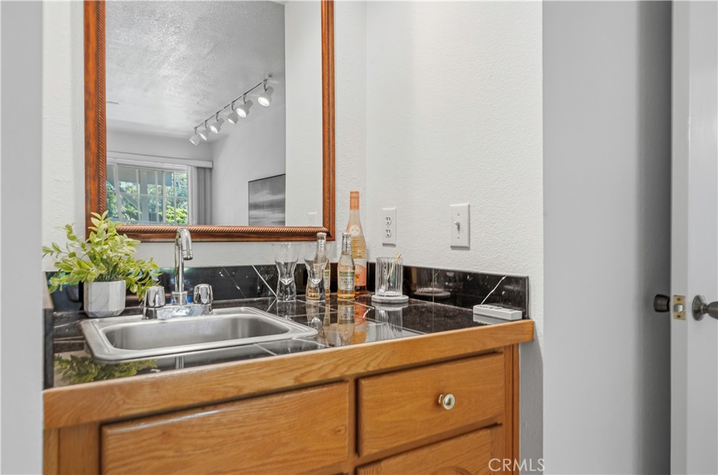 10741 Brookfield Road Chatsworth, CA 91311 - Photo 19 of 41 Wet bar in family room