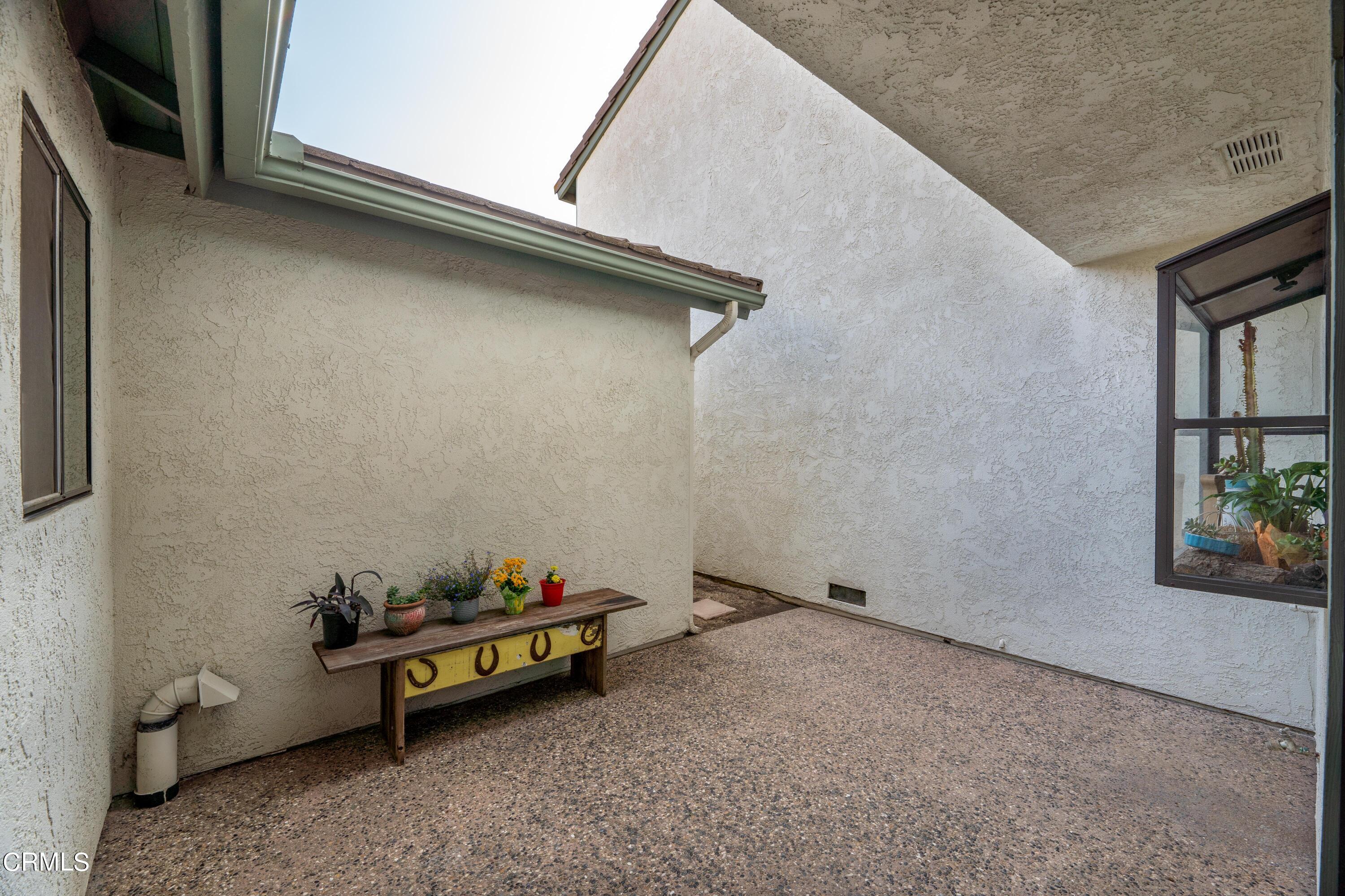 3554 Olds Road Oxnard, CA 93033 - Photo 11 of 27 a backyard of a house with table and chairs