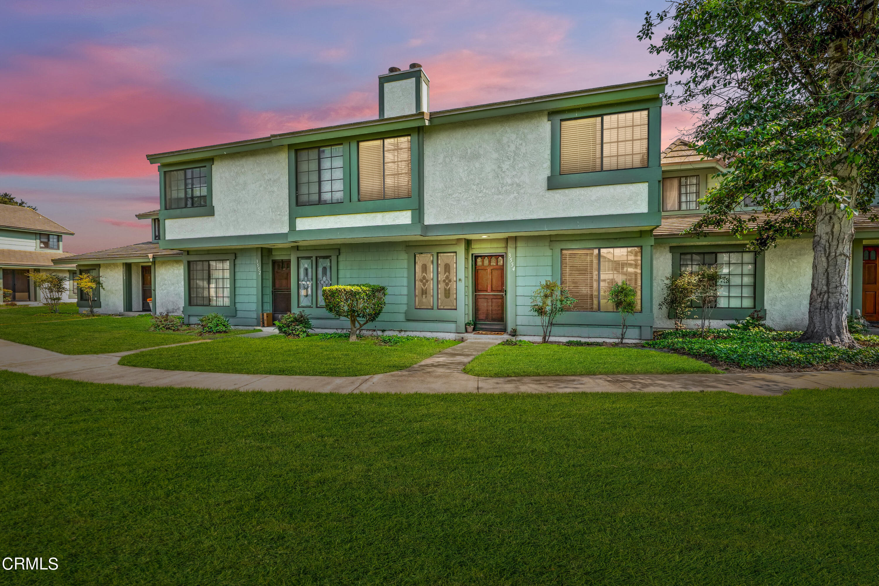 3554 Olds Road Oxnard, CA 93033 - Photo 22 of 27 a front view of a house with a yard