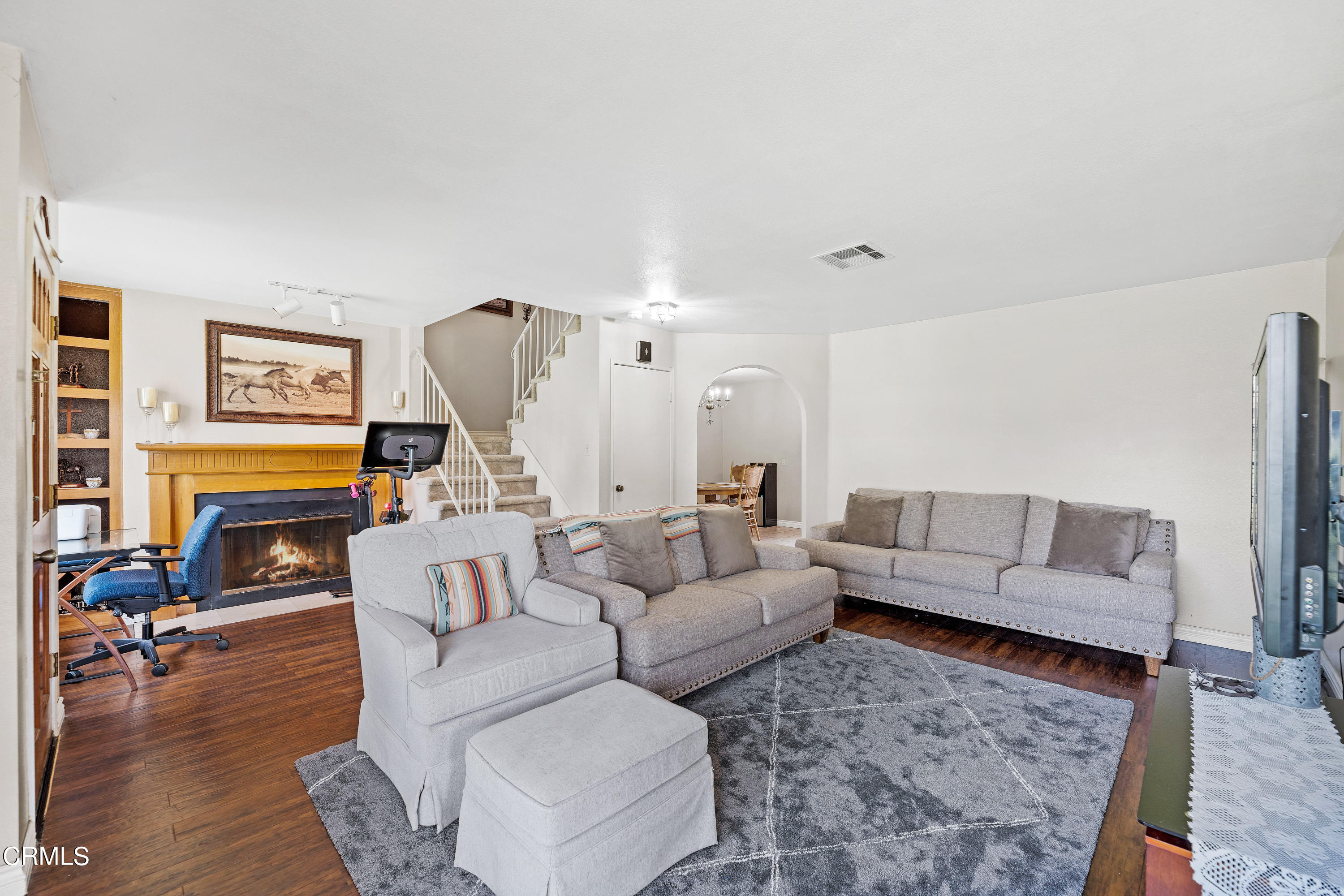 3554 Olds Road Oxnard, CA 93033 - Photo 5 of 27 a living room with furniture and a fireplace