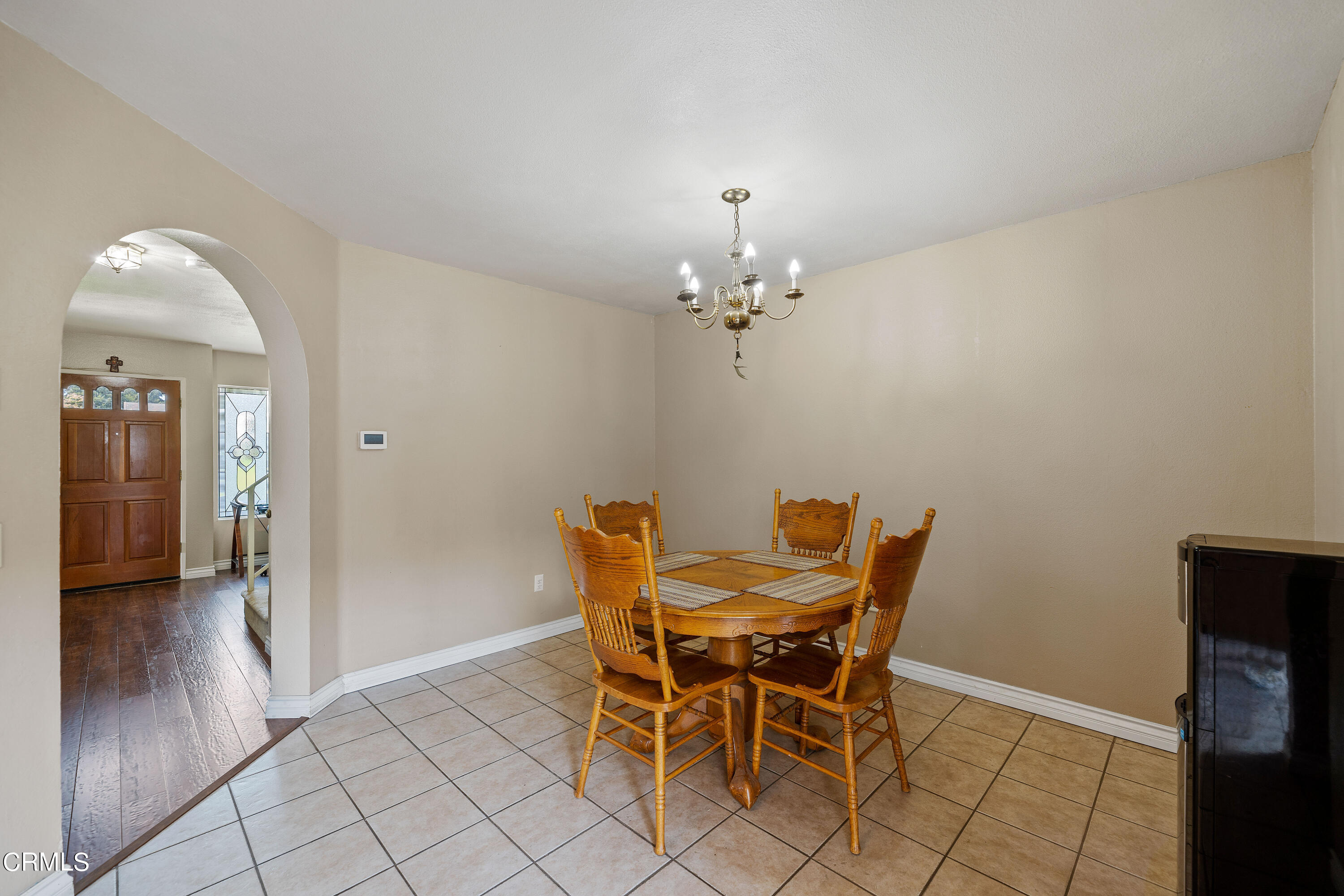 3554 Olds Road Oxnard, CA 93033 - Photo 7 of 27 a view of a dining room with furniture and wooden floor