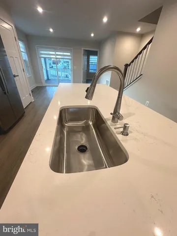 a view of kitchen sink and natural light